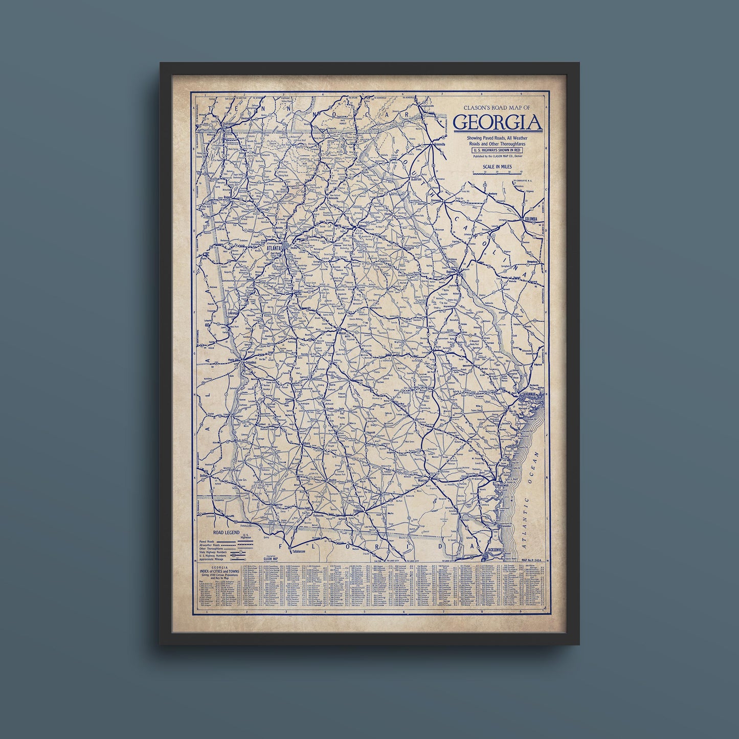 The image is a framed vintage map of Georgia, showing the state's roads and highways in blue and white.