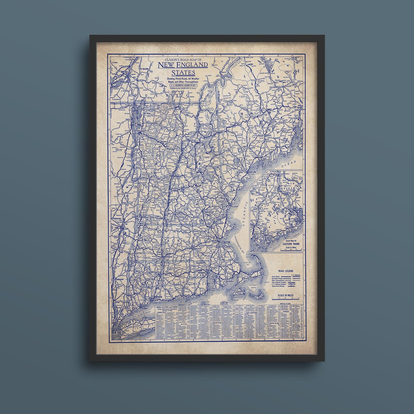 The image is a framed vintage map of the eastern United States, specifically New England, showing the roads and highways of the region.