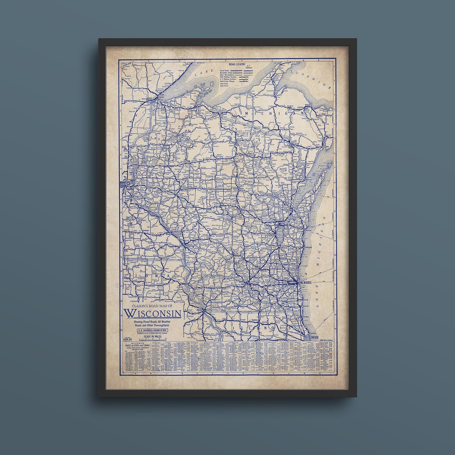 The image is a framed vintage map of Wisconsin, showing the state's roads and highways in blue.