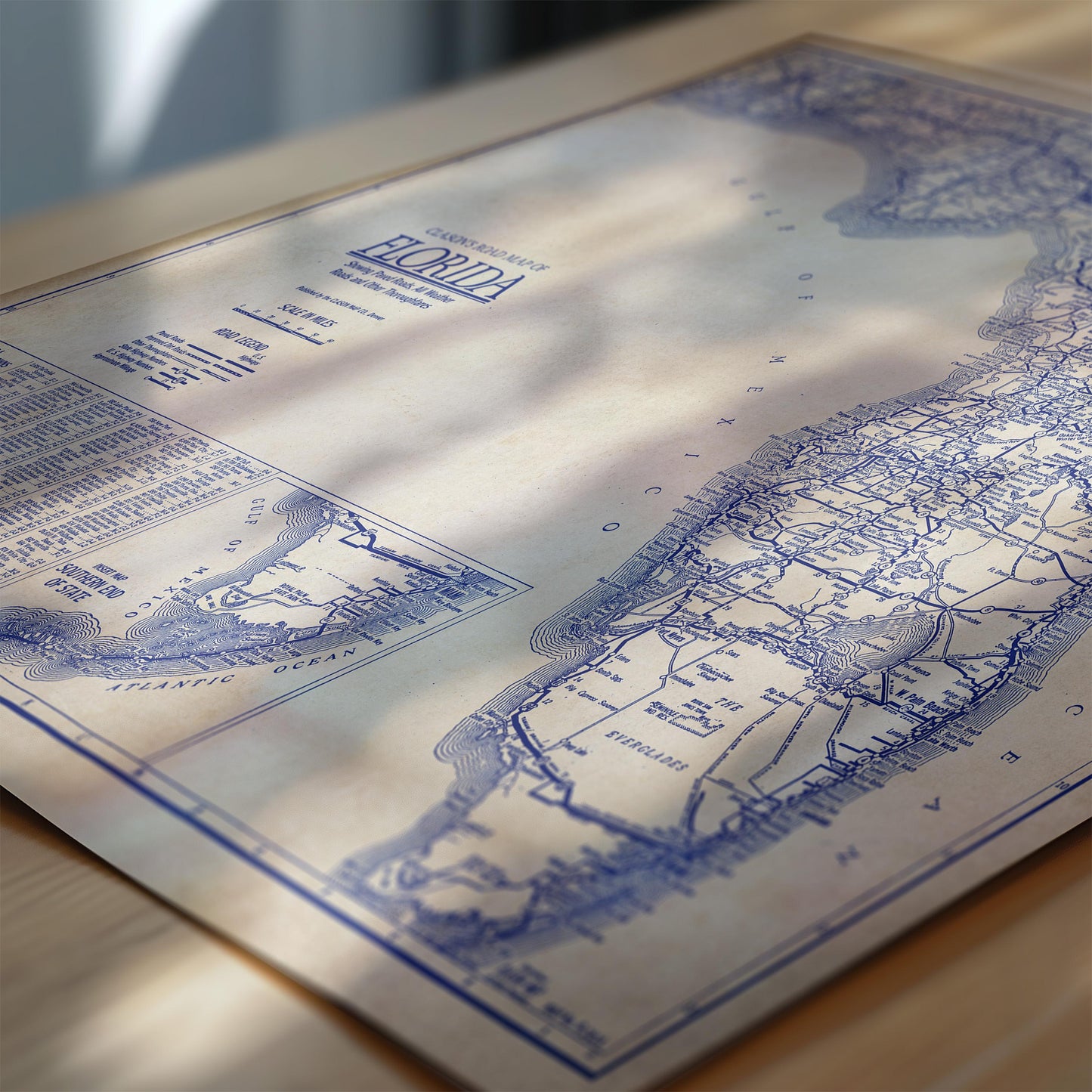 The image is a close-up of a vintage map of Florida, showing the state's coastline and surrounding areas.