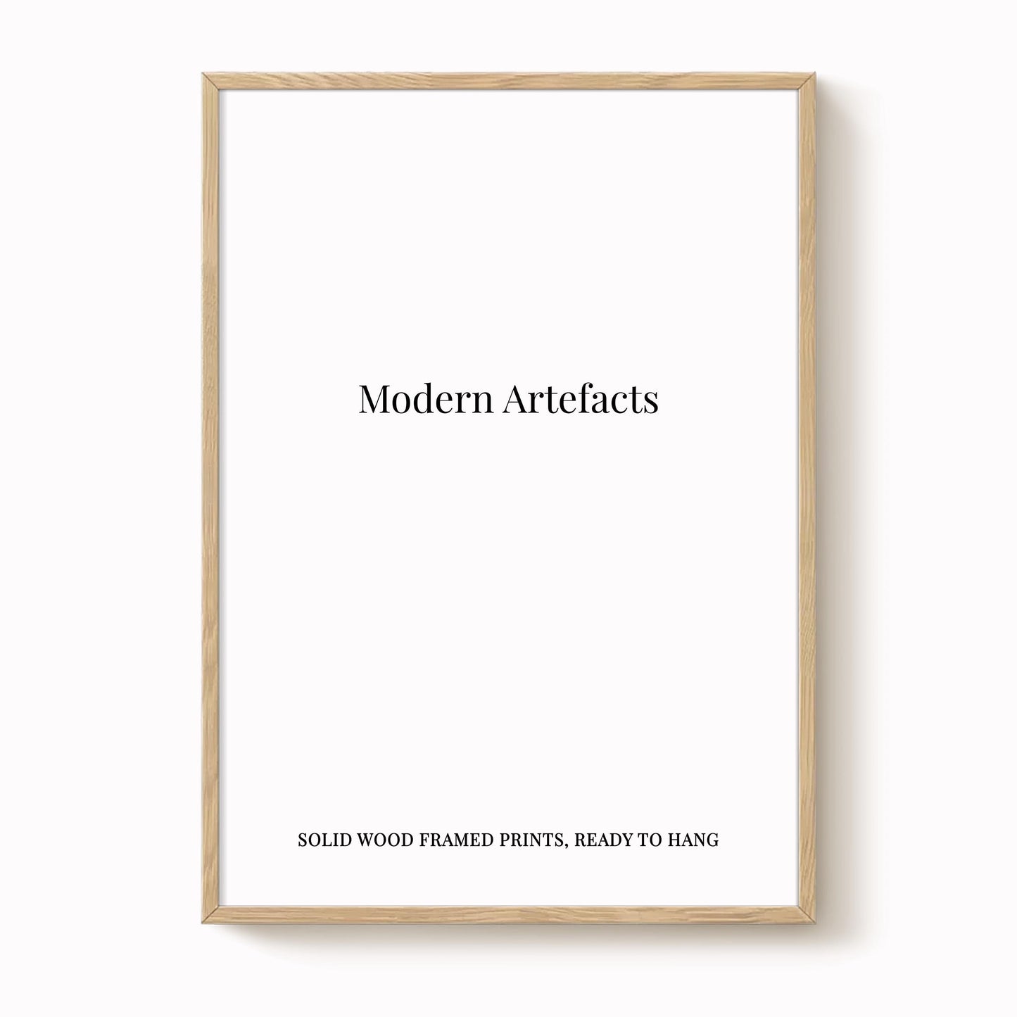 The image is a simple, unadorned white frame with the text "Modern Artifacts" printed on it.