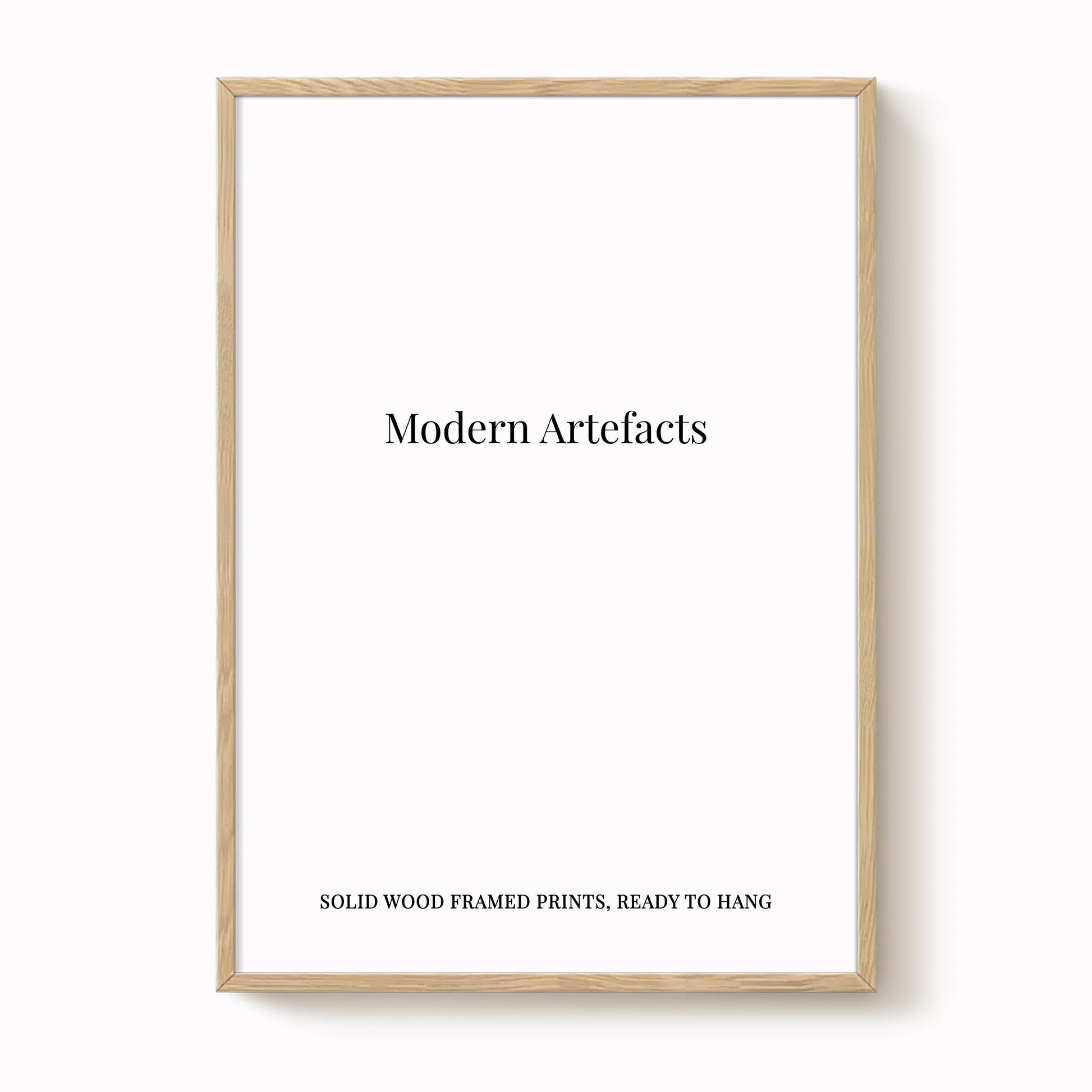 The image is a simple, unadorned white frame with the text "Modern Artifacts" printed on it.