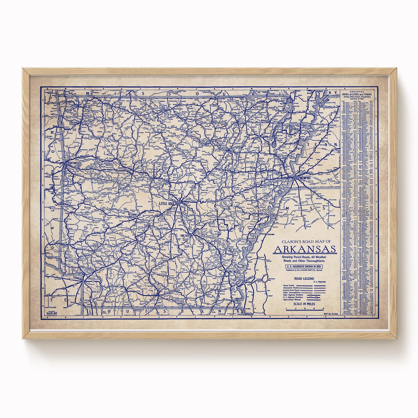 The image is a framed vintage road map of Arkansas, showing the state's road network and highways.