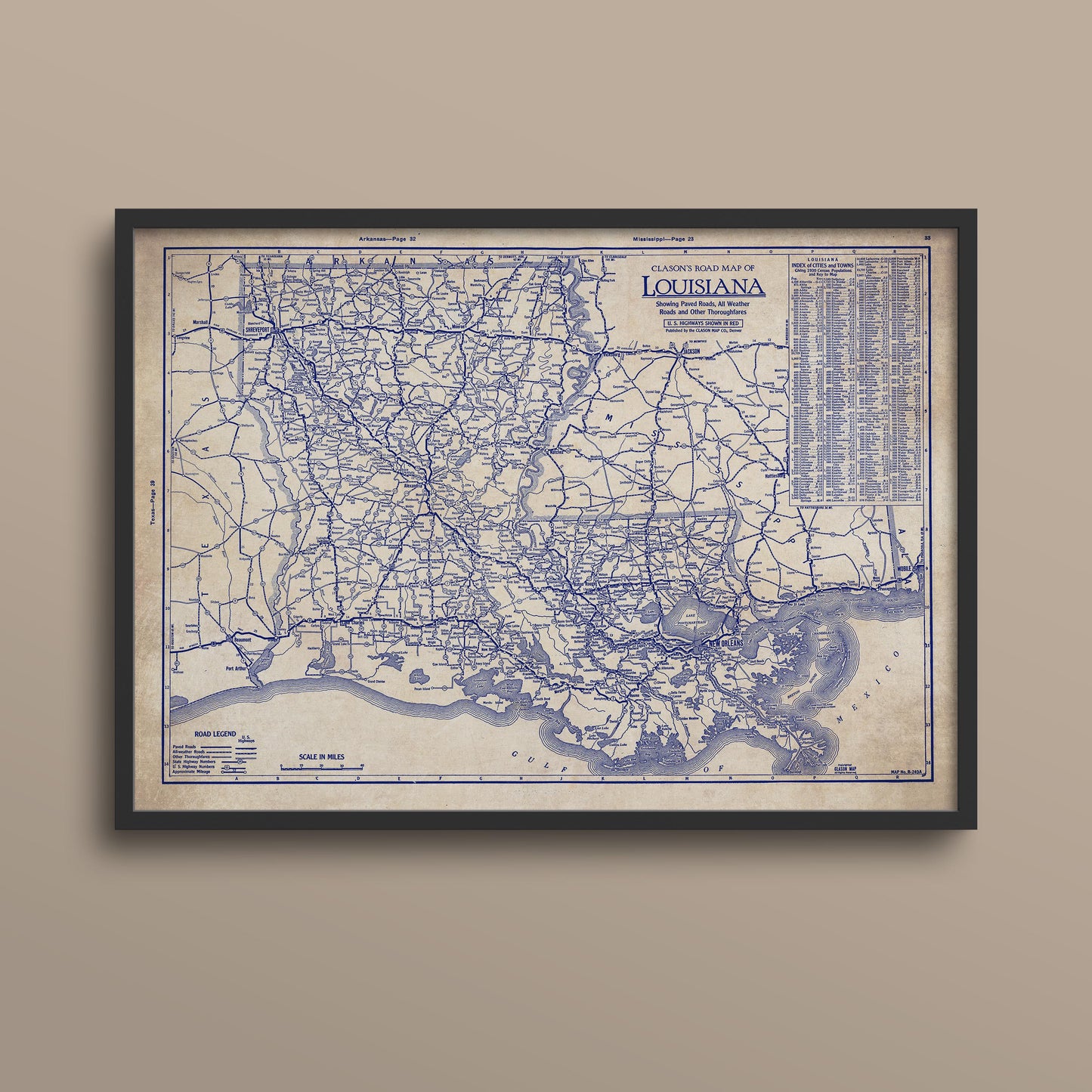 The image is a framed vintage map of Louisiana, depicting the state's road network and surrounding areas.