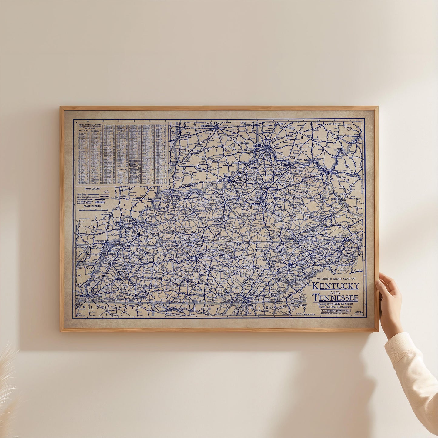 A framed map of Kentucky, Tennessee, and the surrounding areas, with a detailed network of roads and highways.