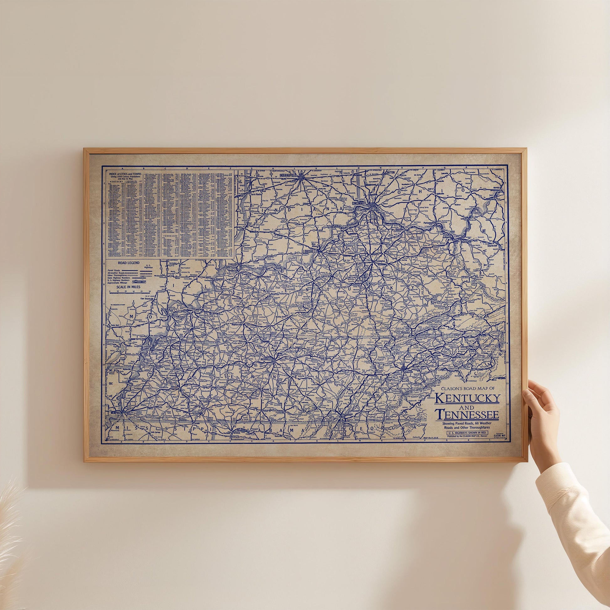 A framed map of Kentucky, Tennessee, and the surrounding areas, with a detailed network of roads and highways.