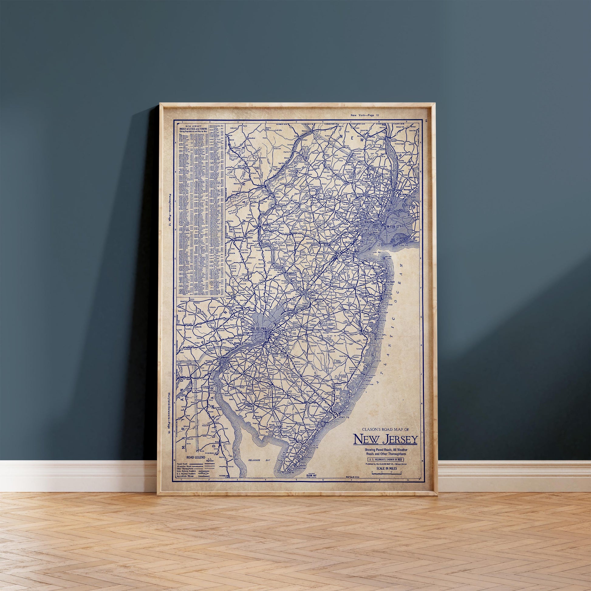 The image is a framed vintage map of New Jersey, showing the state's roads and highways.