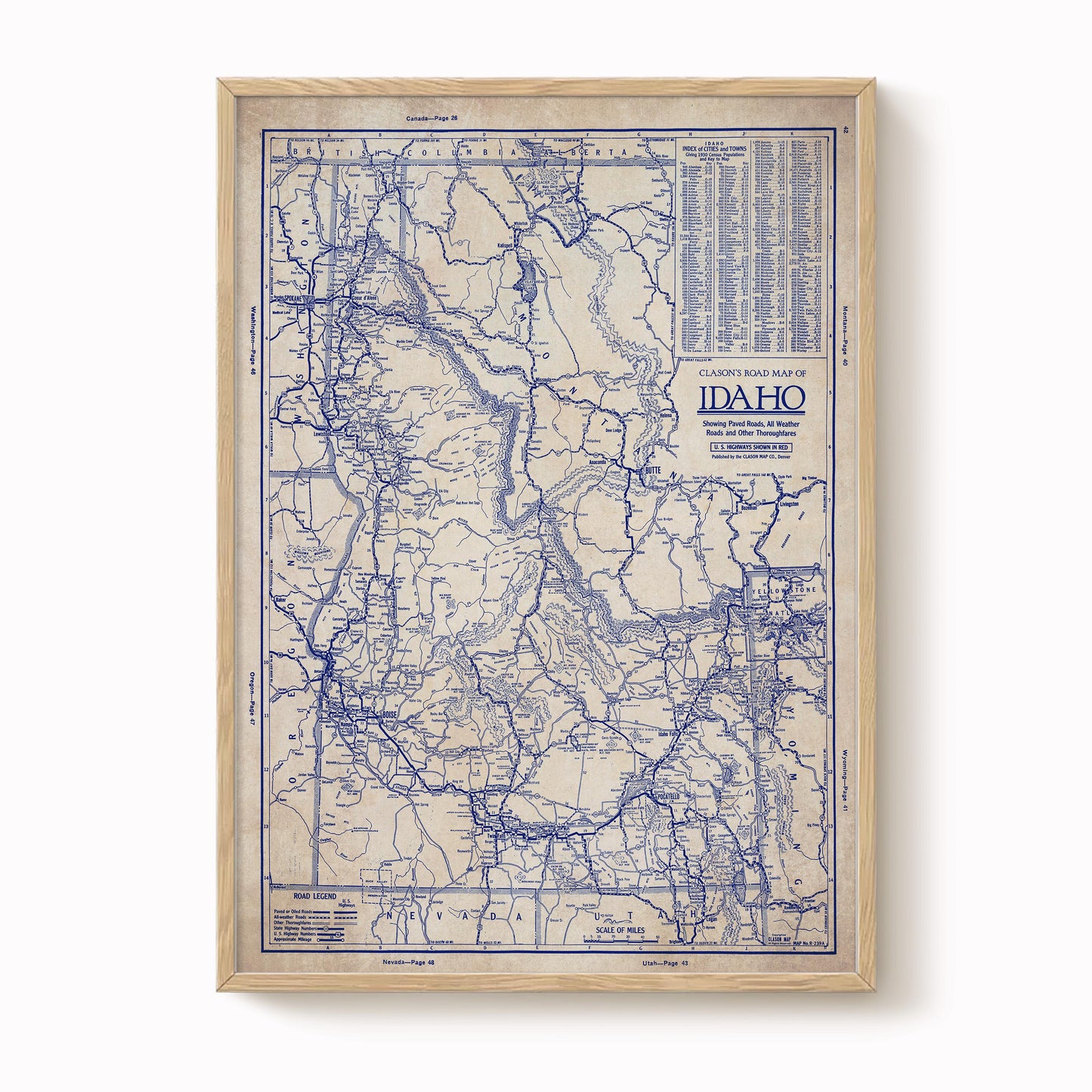The image is a framed vintage map of Idaho, showing the state's roads and highways in blue and white.