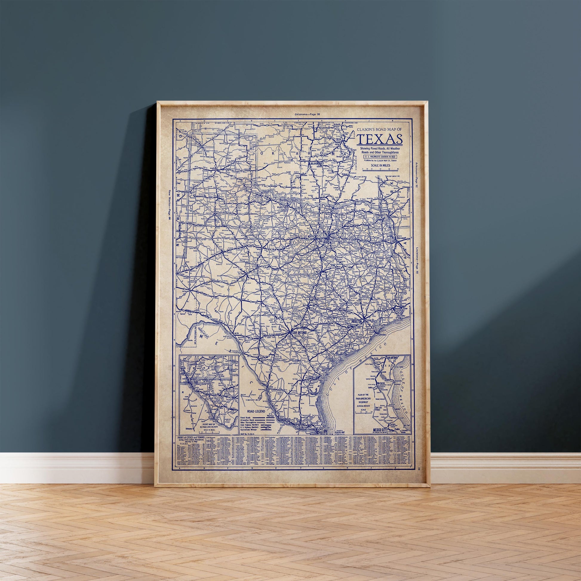 a framed vintage map of Texas, with a detailed and intricate design.