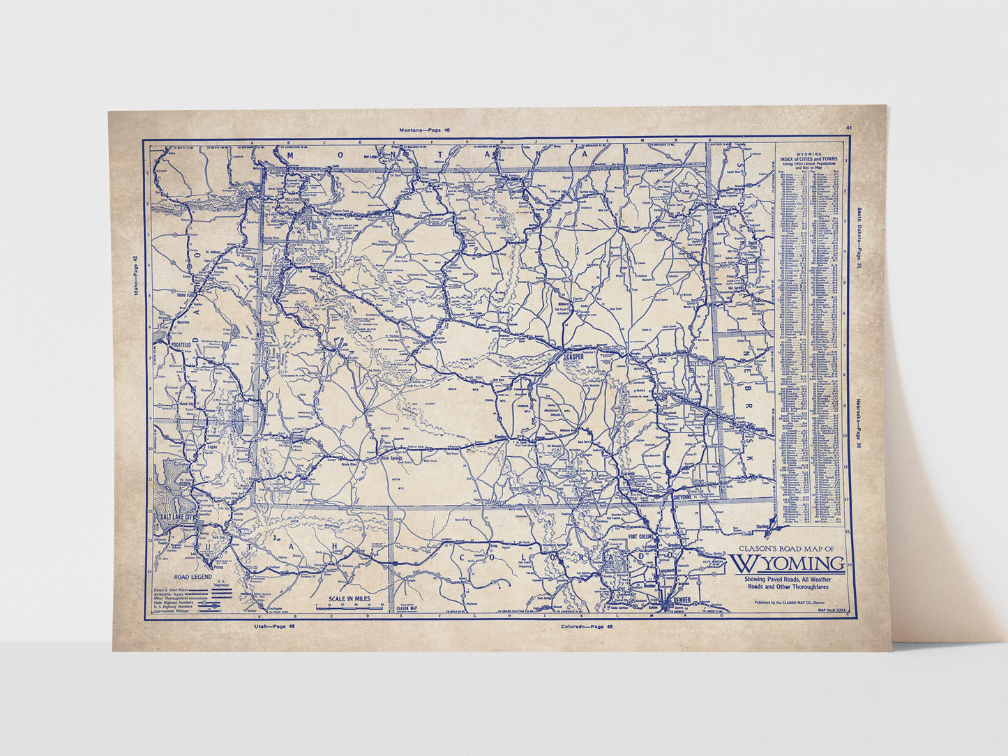The image is a vintage map of Wyoming, depicting the state's roads and highways in a detailed and intricate manner.