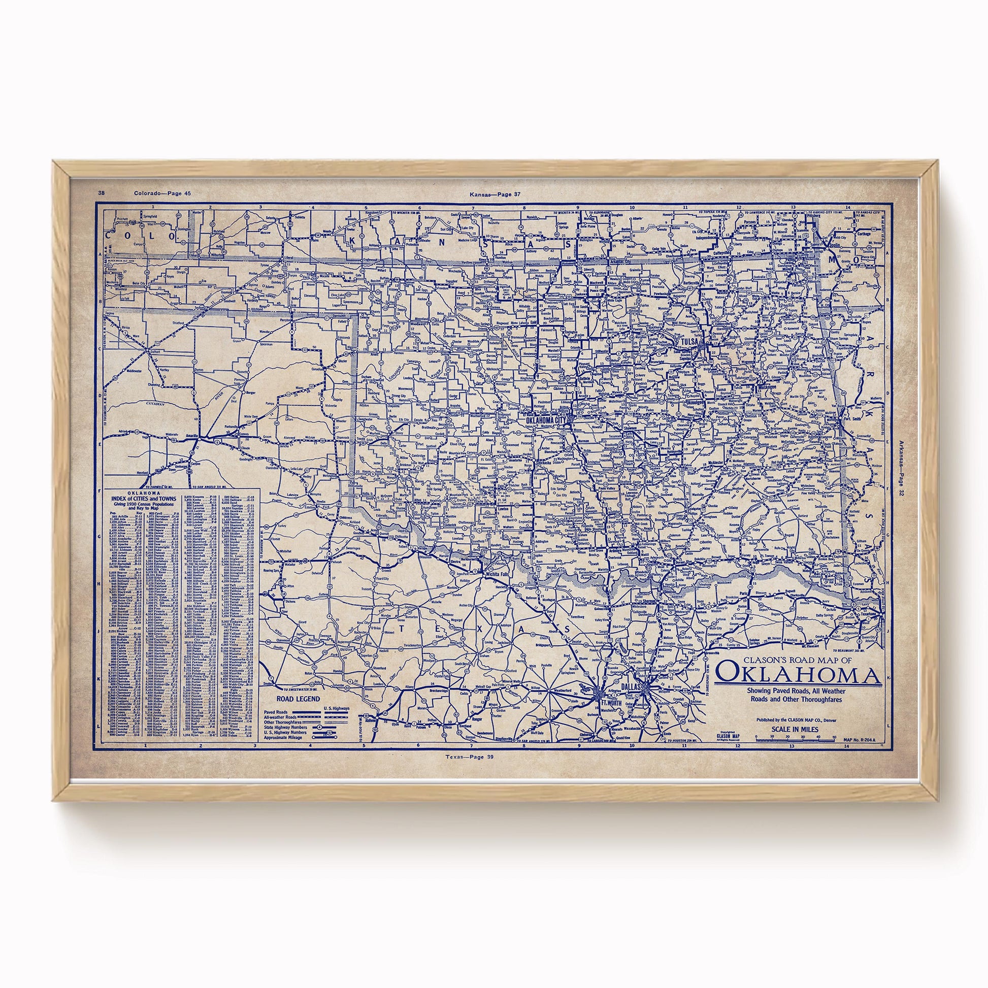 The image is a framed vintage map of Oklahoma, showing the state's roads and highways in a detailed and intricate manner.