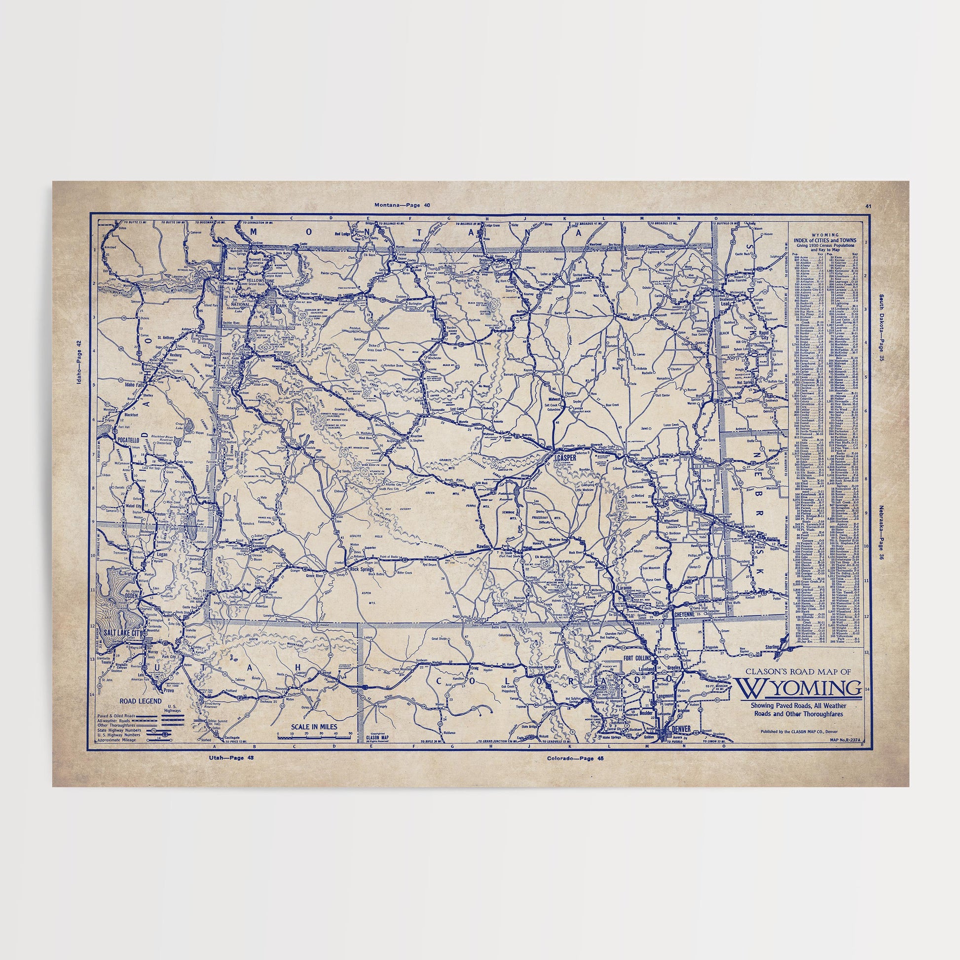 The image is a vintage road map of Wyoming, depicting the state's roads and highways in a detailed and intricate manner.