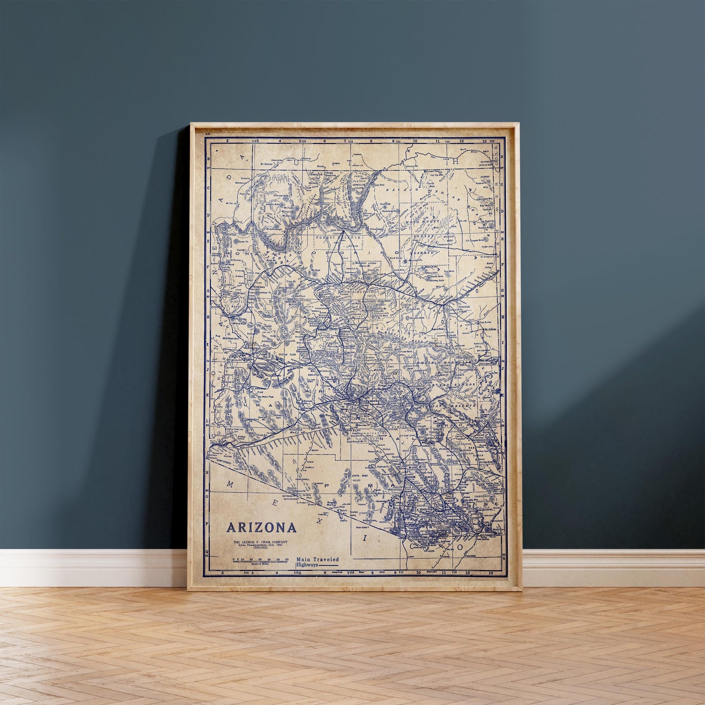 a framed map of Arizona, with the state's borders and major cities clearly visible.