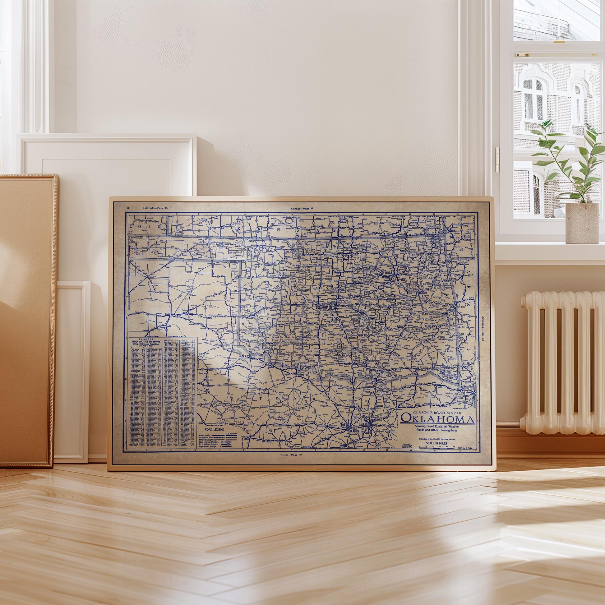 a large framed map of Oklahoma, with a detailed and intricate design.