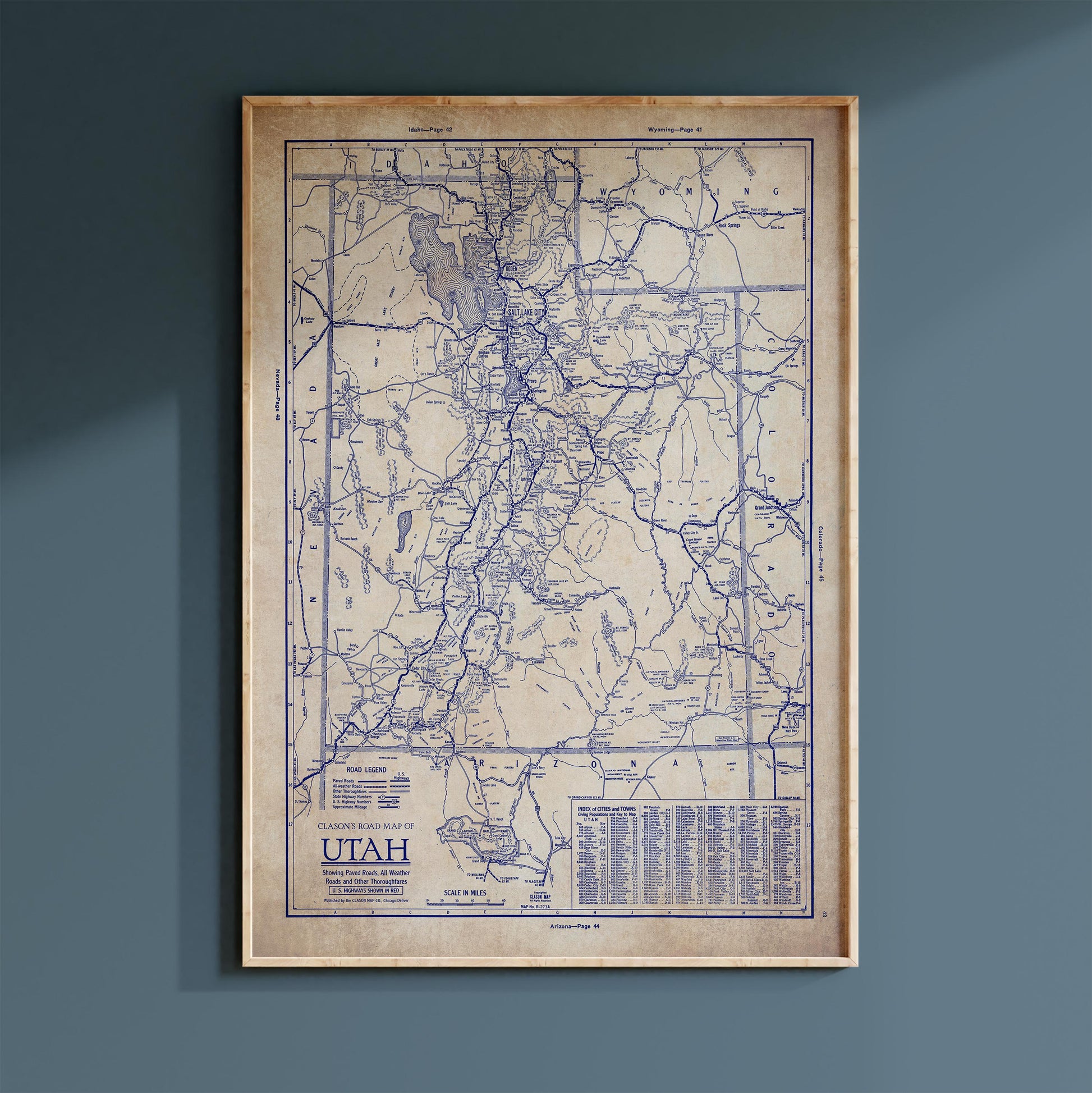 The image is a framed vintage map of Utah, depicting the state's geographical layout and major cities.