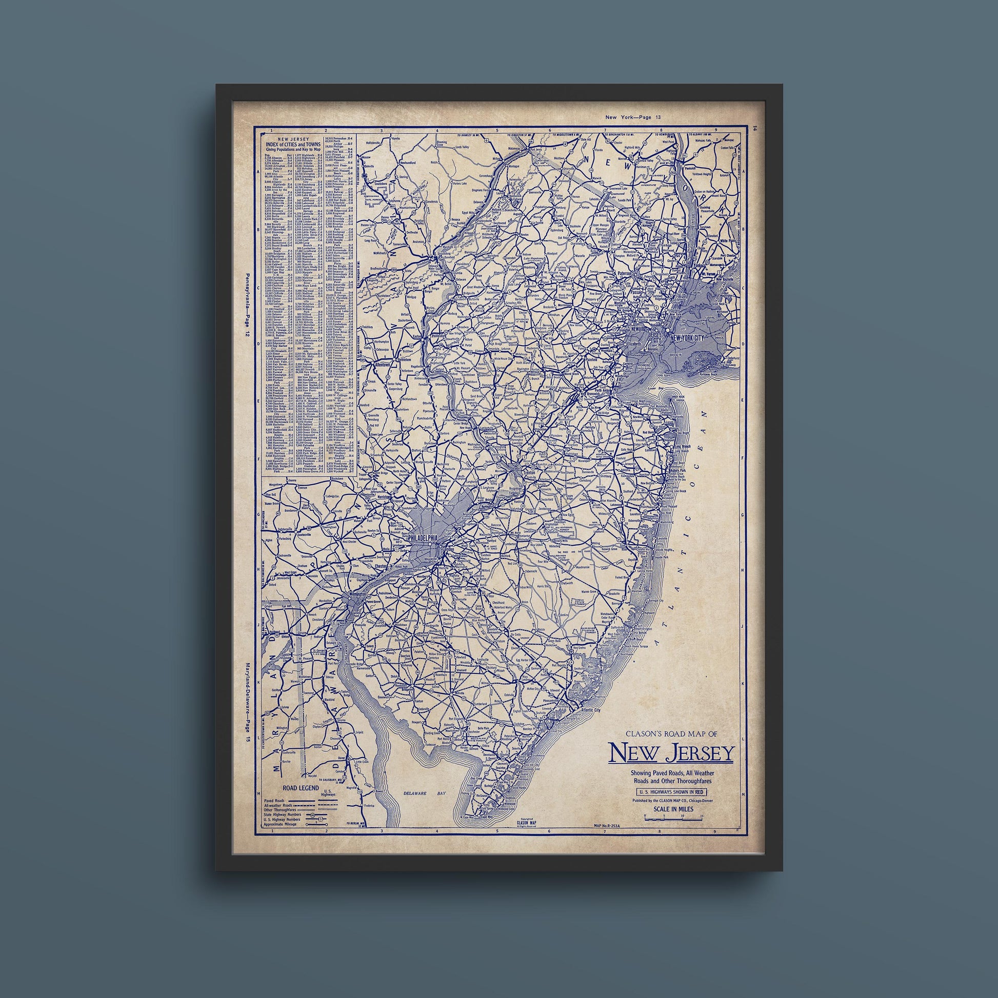 The image is a framed vintage map of New Jersey, depicting the state's roads and highways in a detailed and intricate manner.