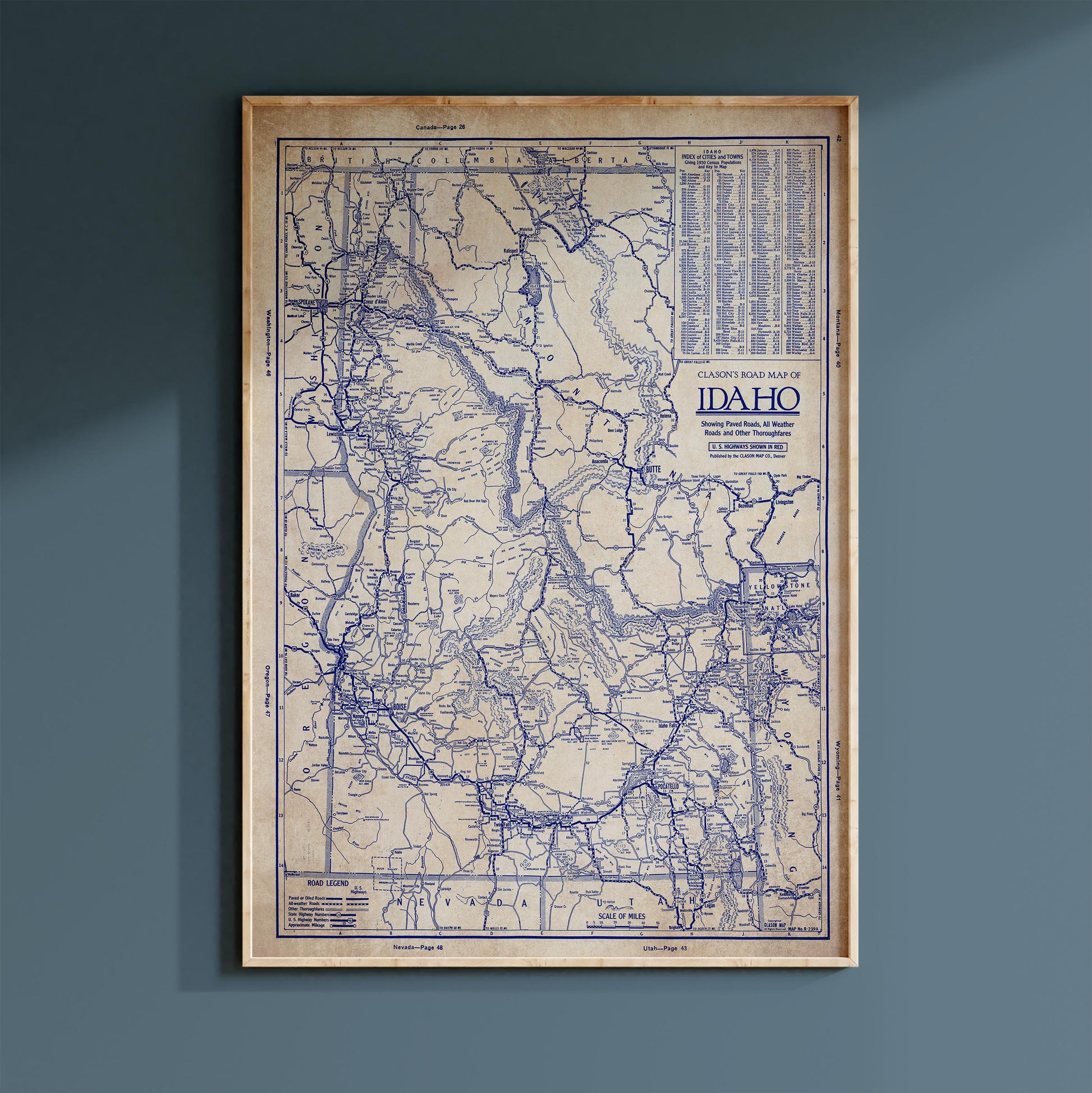 The image is a framed vintage map of Idaho, showing the state's geographical layout and major roads.