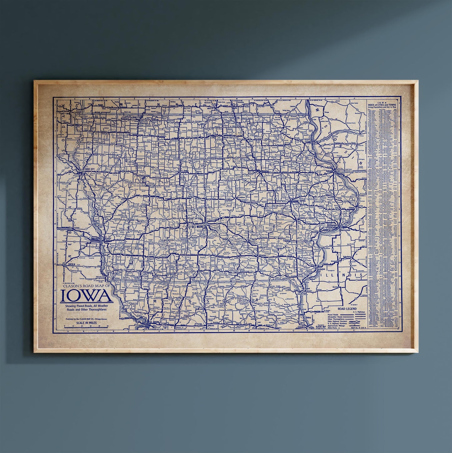 The image is a framed map of Iowa, showing the state's roads and highways in a detailed and comprehensive manner.