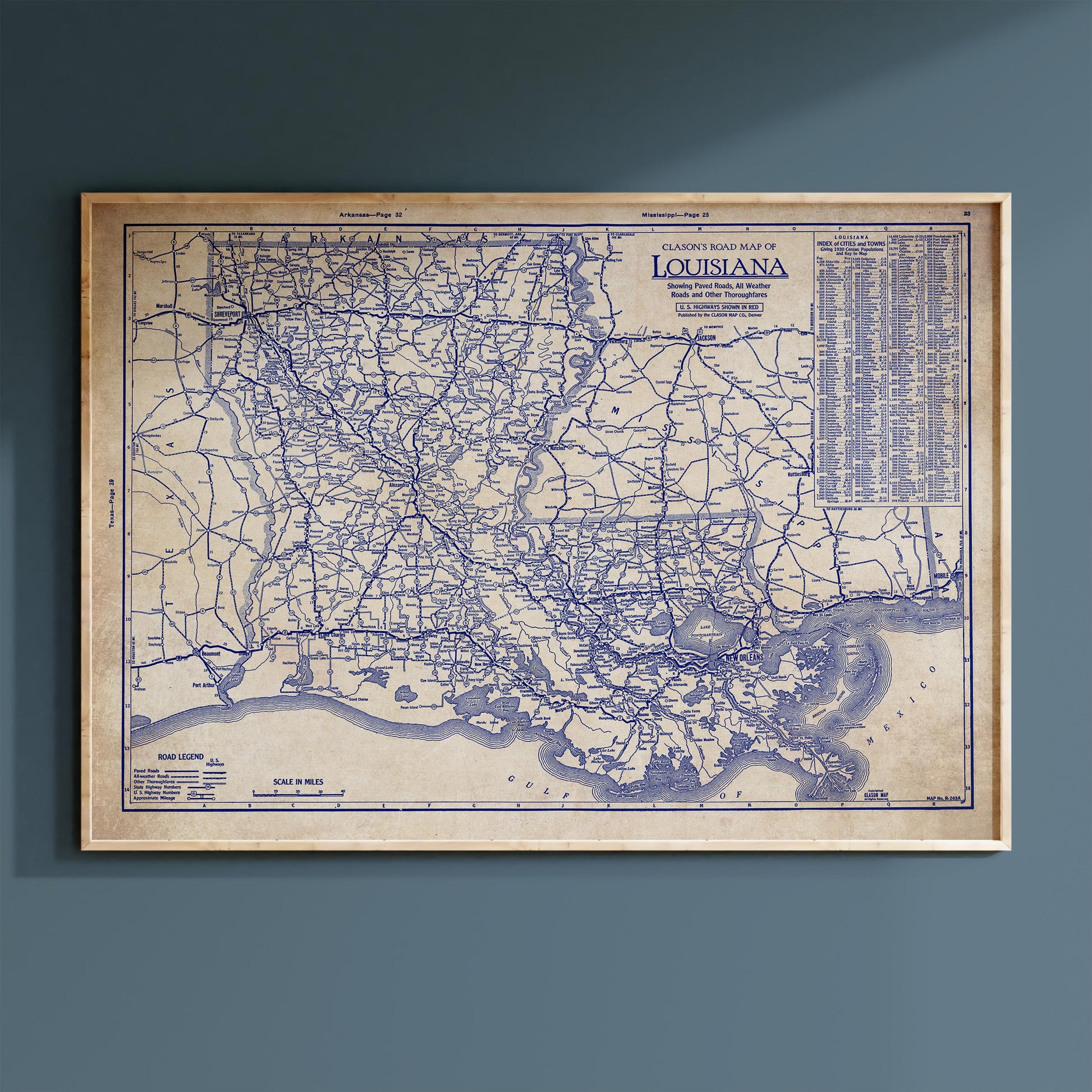 The image is a framed vintage map of Louisiana, depicting the state's roads and highways in a detailed and intricate manner.