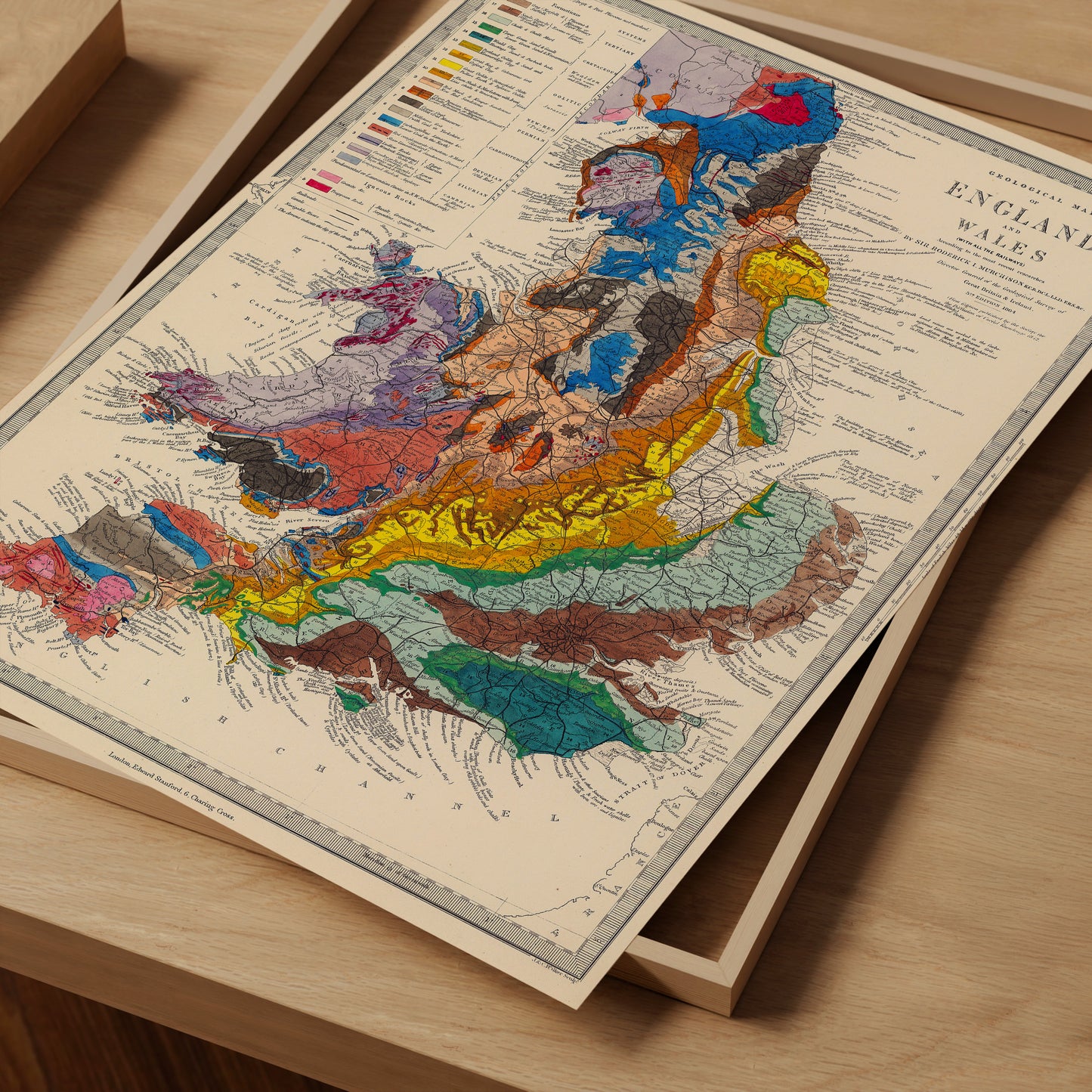 The image is a vintage geological map of England and Wales, featuring a detailed and colorful depiction of the region's geological features.