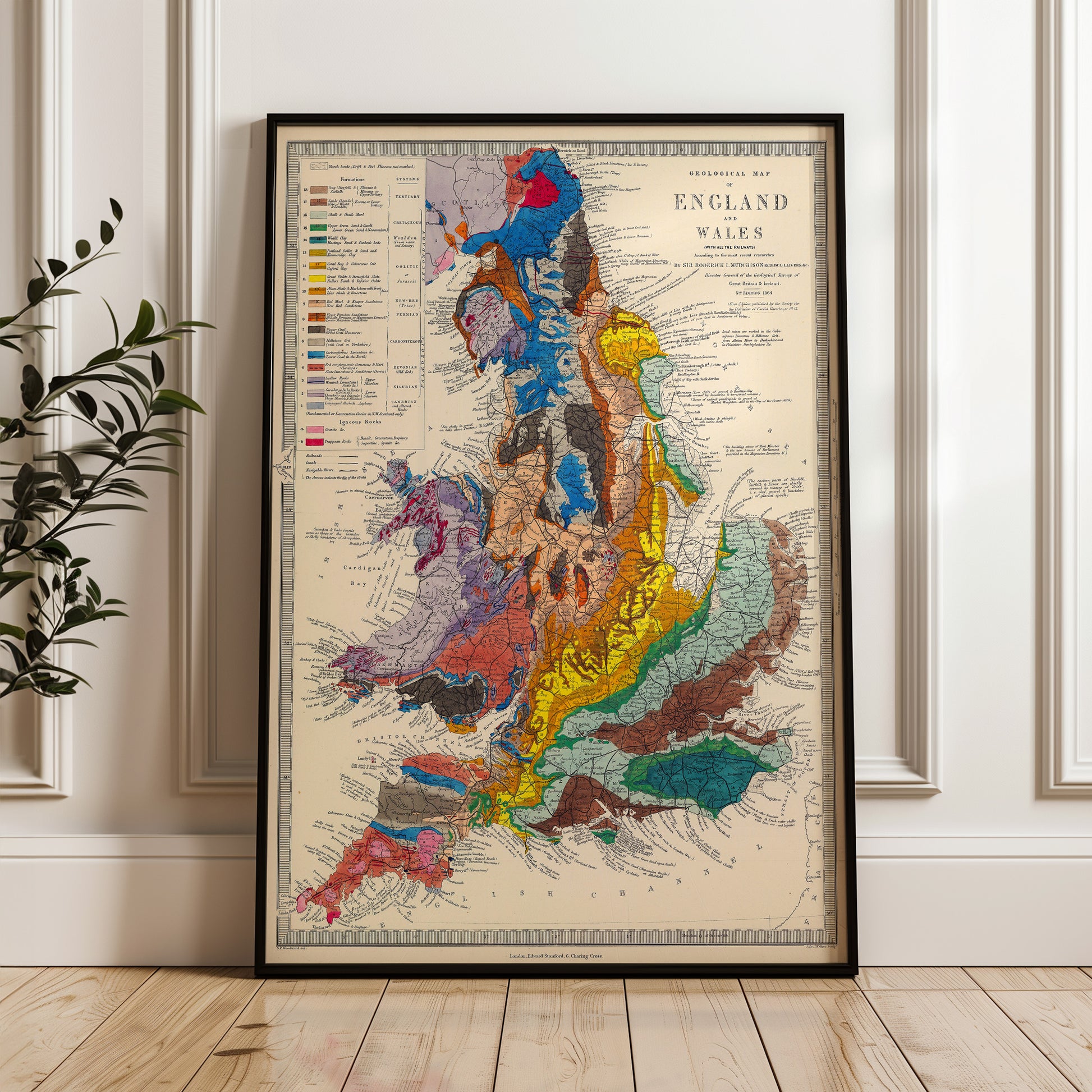 The image is a framed geological map of England, Wales, and Scotland, depicting the various geological features and regions of the United Kingdom.