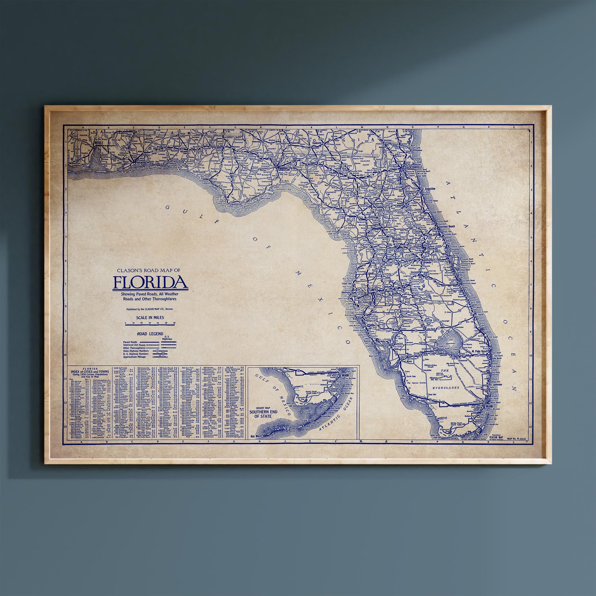 The image is a framed vintage map of Florida, showing the state's roads and highways in blue.