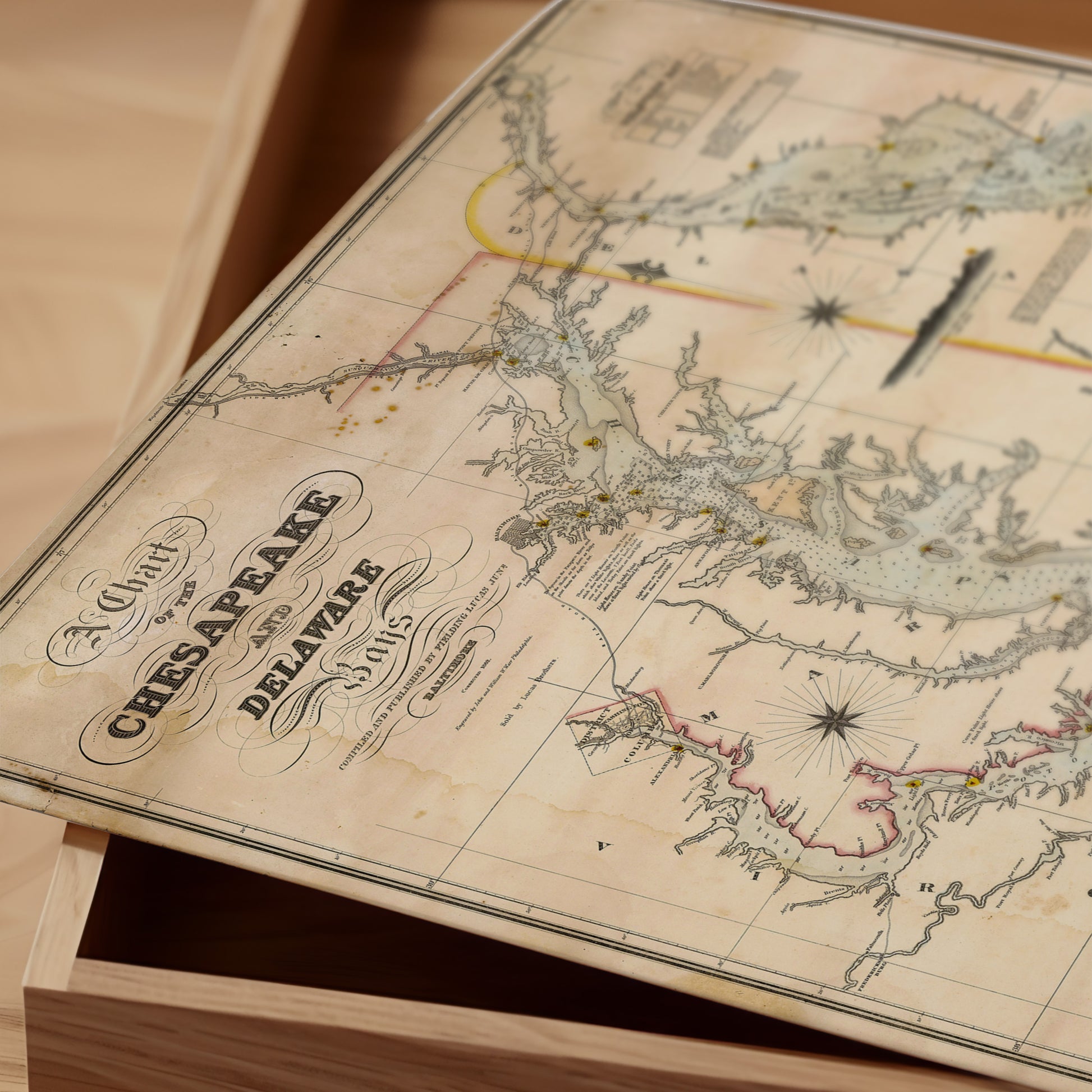 An old map of the Chesapeake Bay region, depicting the coastline and surrounding areas, with various landmarks and bodies of water marked on it.