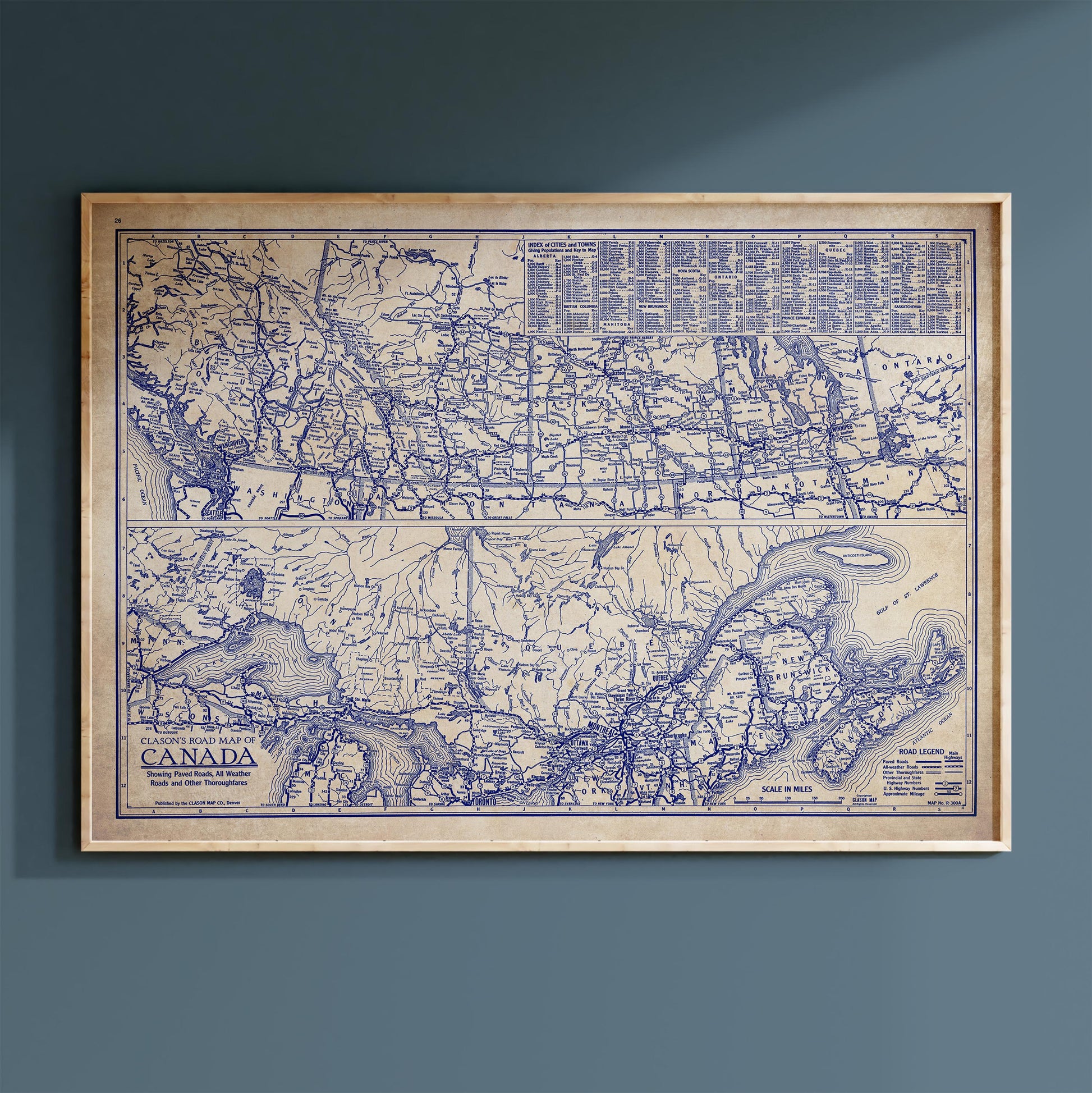 The image is a framed vintage map of Canada, depicting the country's geographical layout and major geographical features.