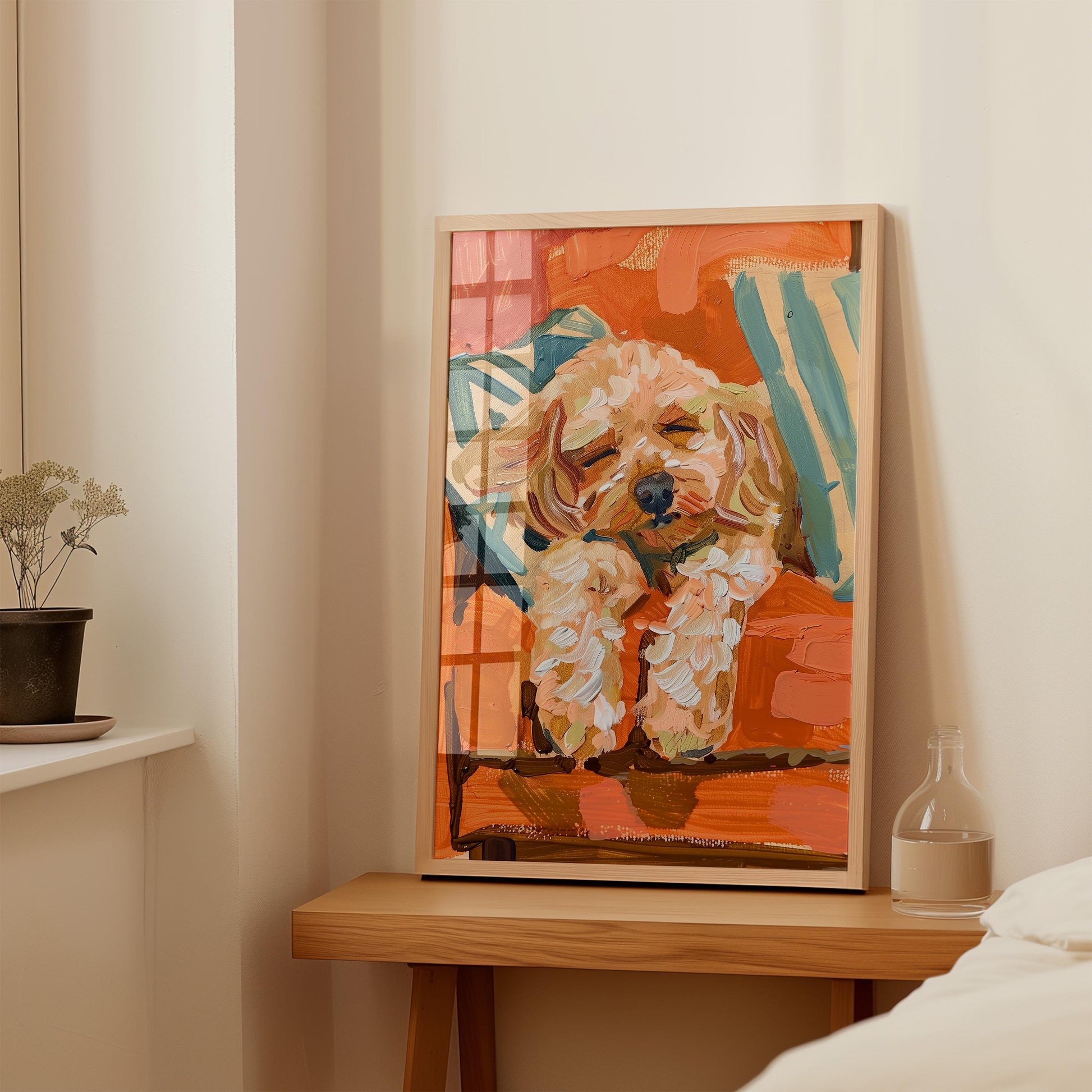 a painting of a dog resting on a bed, which is displayed on a wooden table.