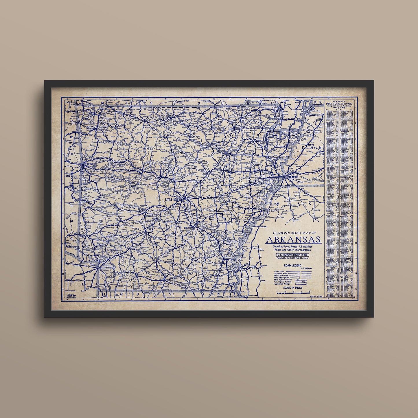 The image is a framed vintage map of the state of Arkansas, depicting the state's roads and highways in a detailed and intricate manner.
