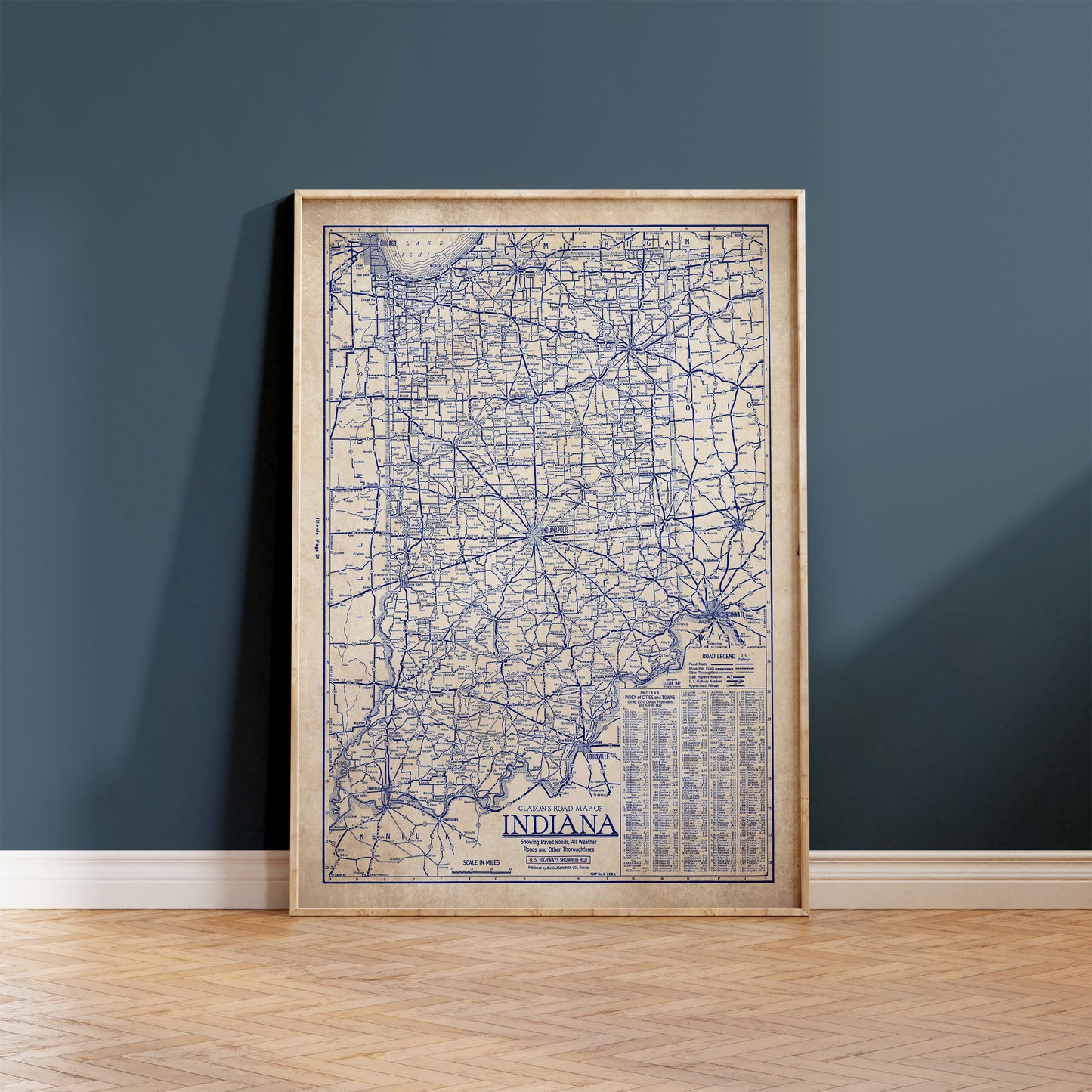 The image is a framed vintage map of Indiana, showing the state's roads and highways.