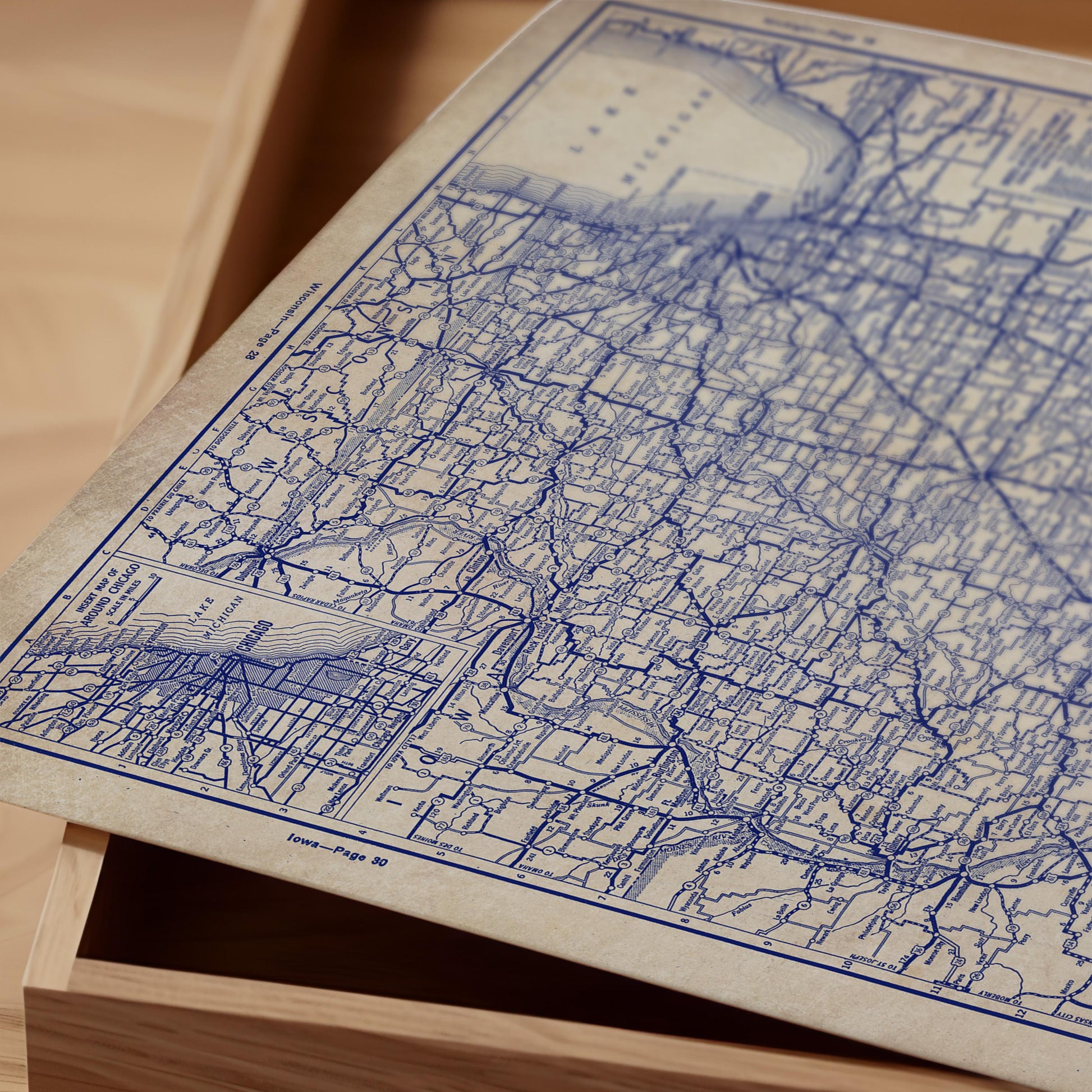 a close-up view of a detailed map of the United States, with intricate blue lines and markings representing roads, rivers, and other geographical features.