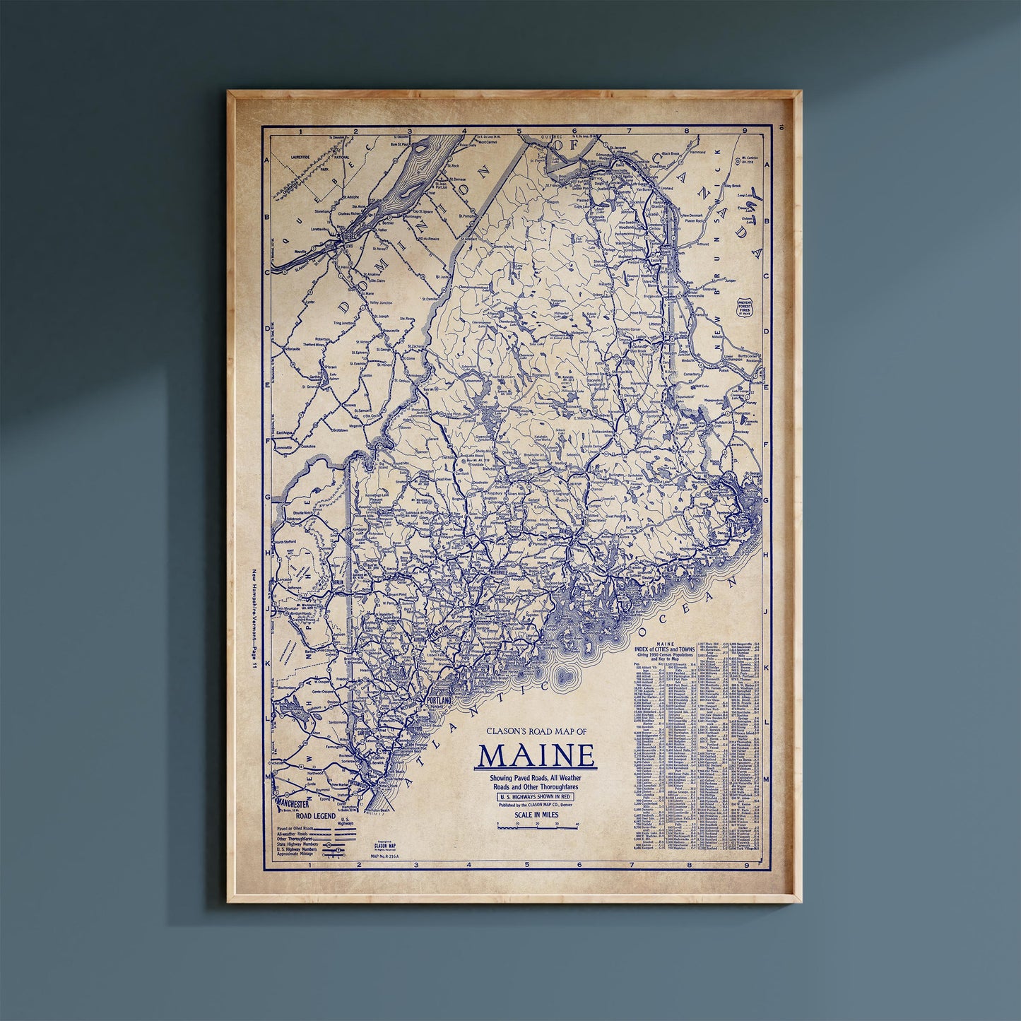 The image is a framed vintage map of Maine, showing the state's roads and highways in a detailed and detailed manner.