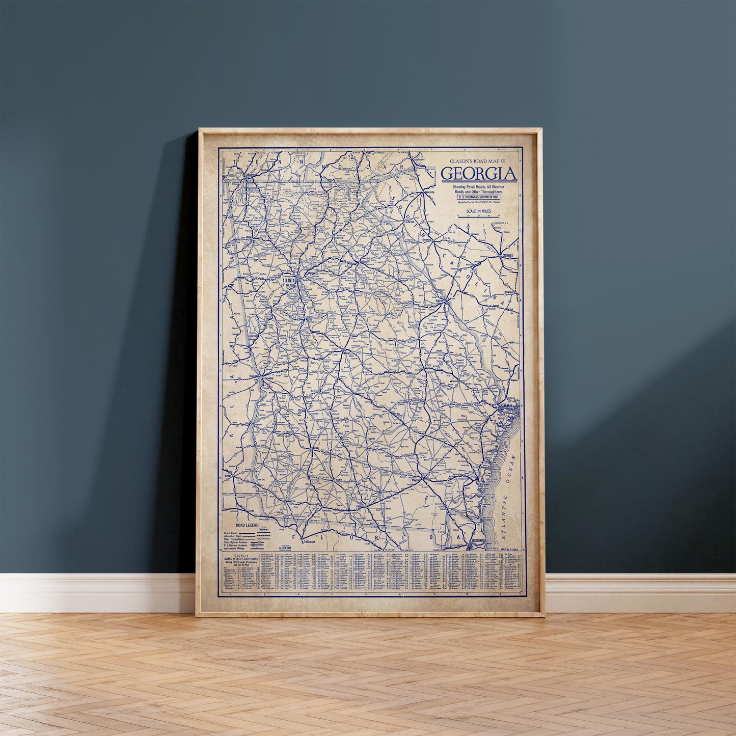a framed map of Georgia, with a detailed network of roads and highways.