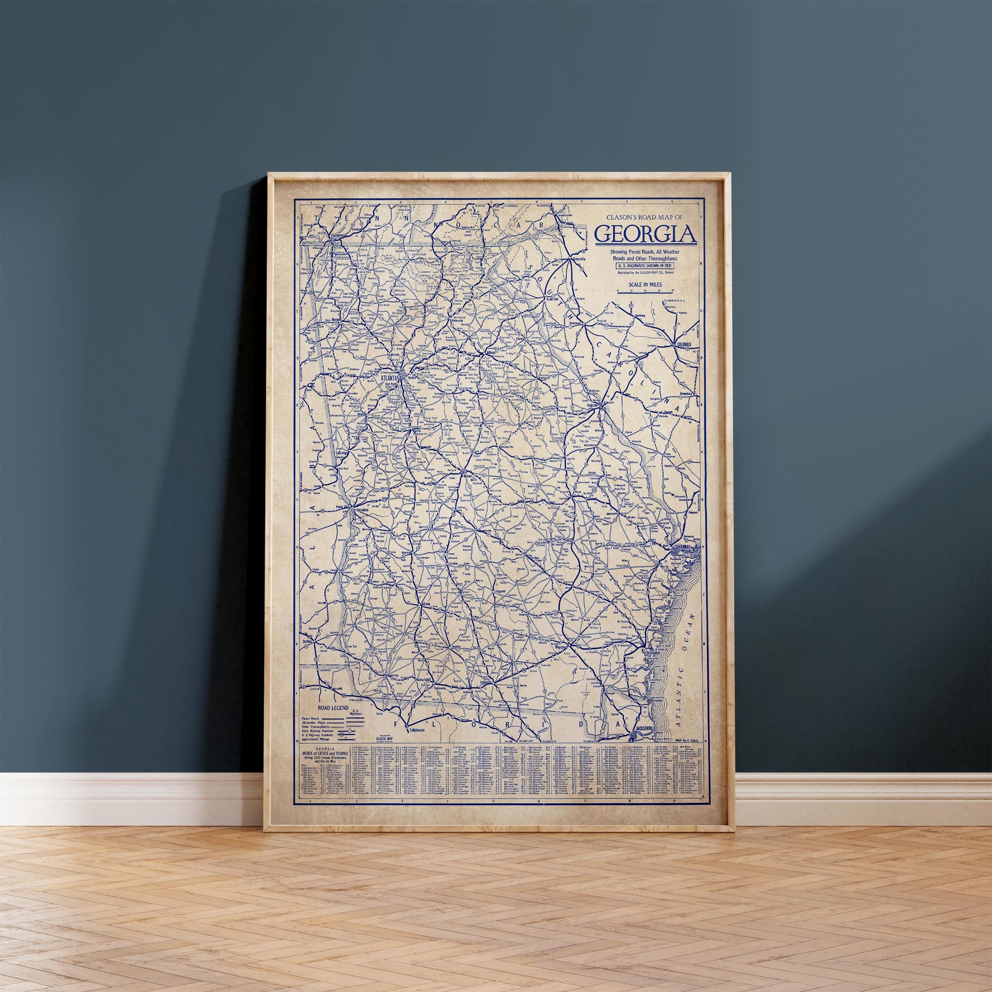 a framed map of Georgia, with a detailed network of roads and highways.