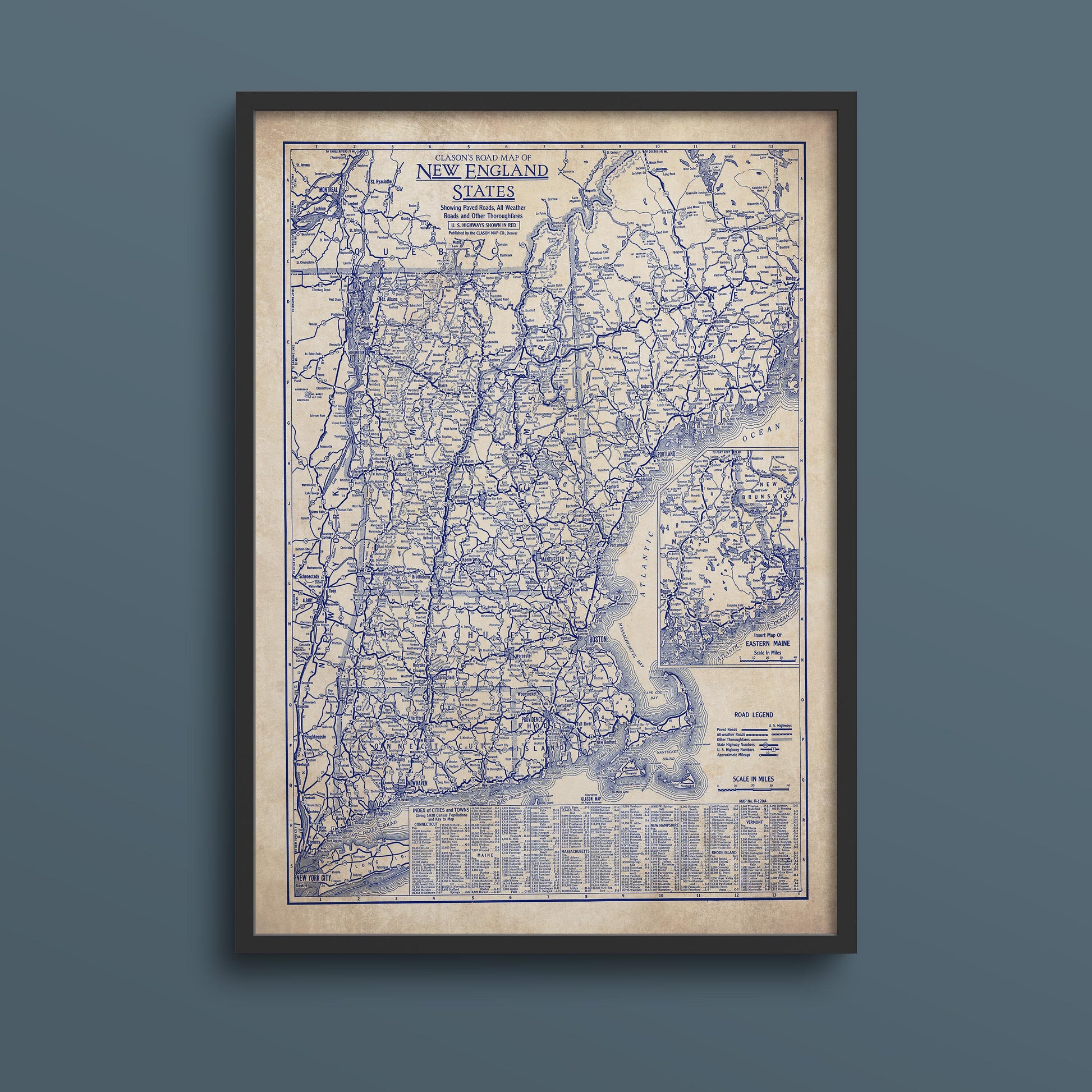 The image is a framed vintage map of the eastern United States, specifically New England, showing the roads and highways of the region.