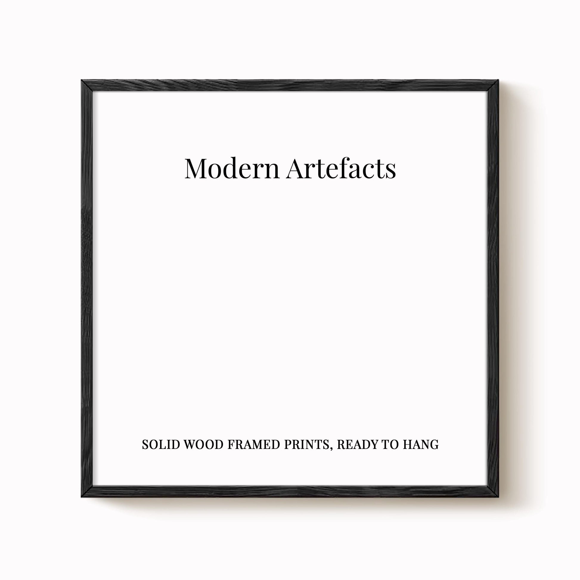 The image is a square frame with the text "Modern Artifacts" written in black at the top. Below the text, it says "SOLID WOOD FRAMED PRINTS. READY TO HANG".