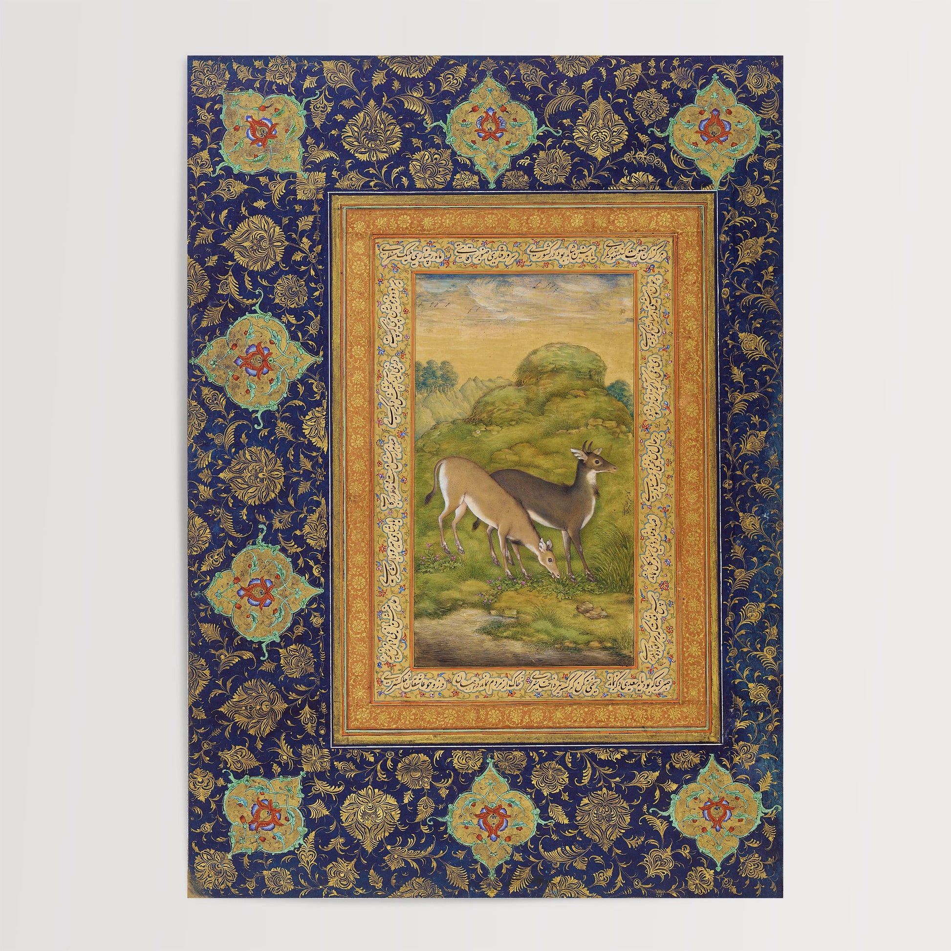 The image is a framed painting depicting two deer in a natural setting, surrounded by a decorative border with intricate floral patterns.
