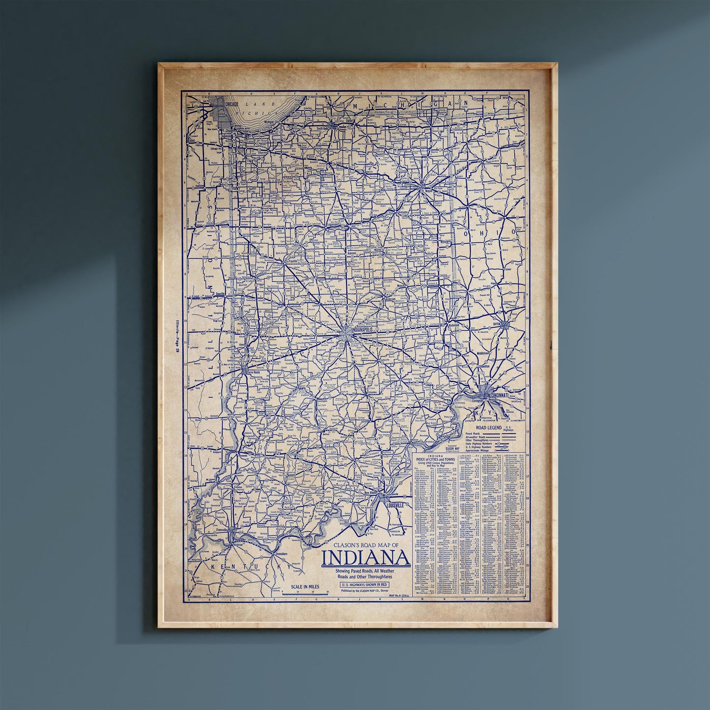 The image is a framed vintage map of Indiana, showing the state's roads and highways in a detailed and detailed manner.