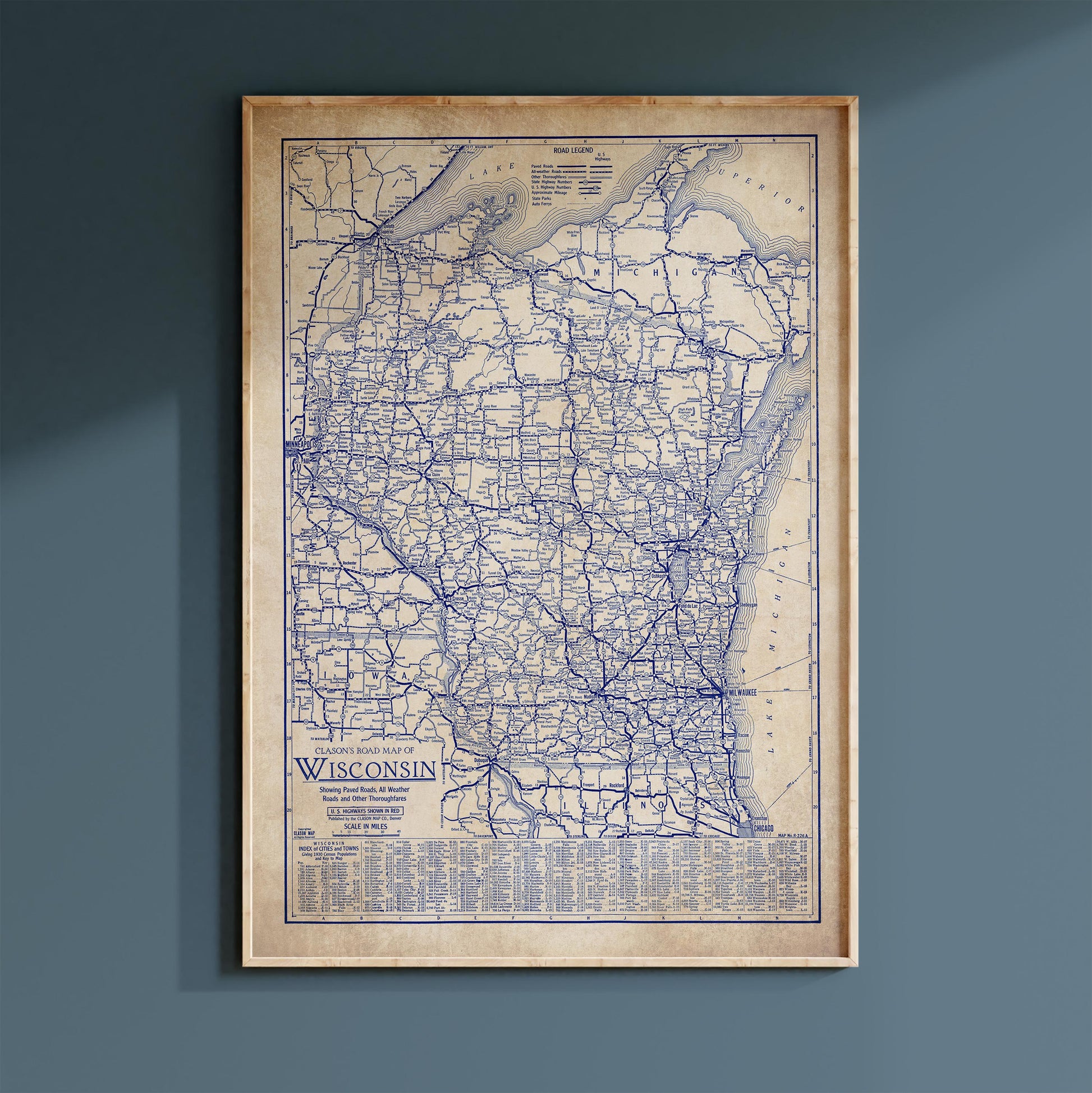 The image is a framed vintage map of Wisconsin, showing the state's roads and highways.