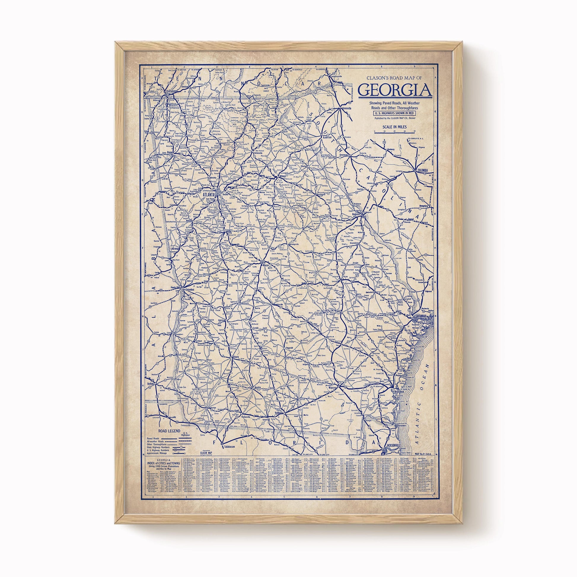 The image is a framed vintage map of Georgia, depicting the state's road network in blue and white.