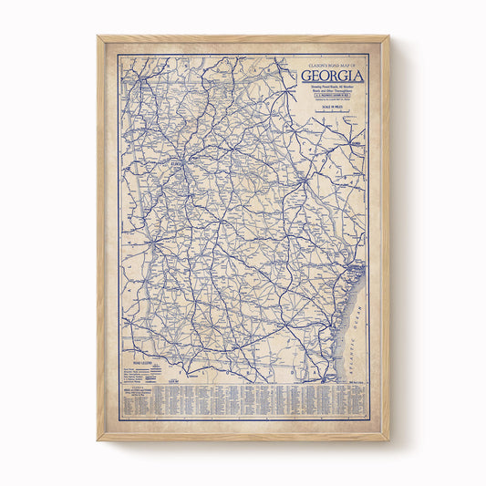The image is a framed vintage map of Georgia, depicting the state's road network in blue and white.
