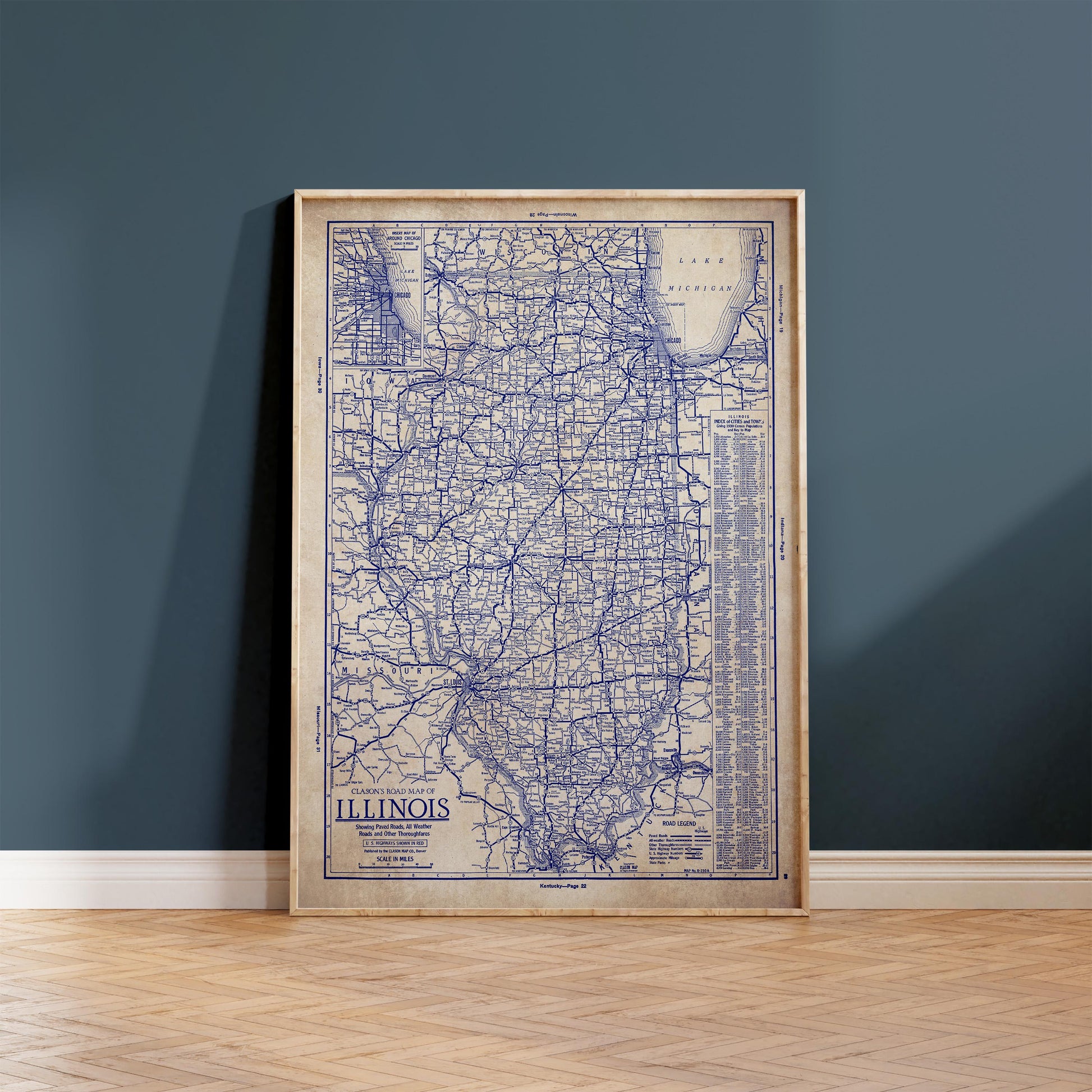 a framed vintage map of Illinois, with a blue and white color scheme.