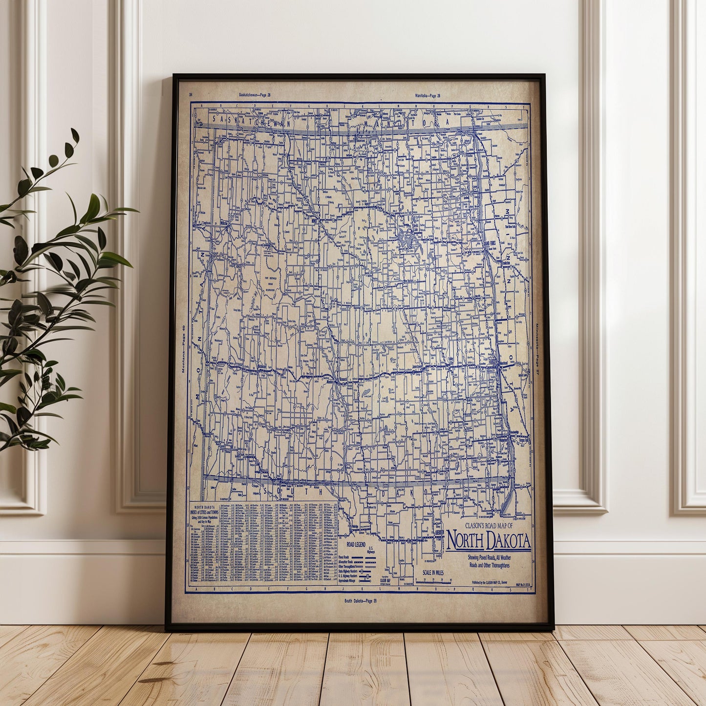 a framed map of North Dakota, with a detailed blue and white color scheme.