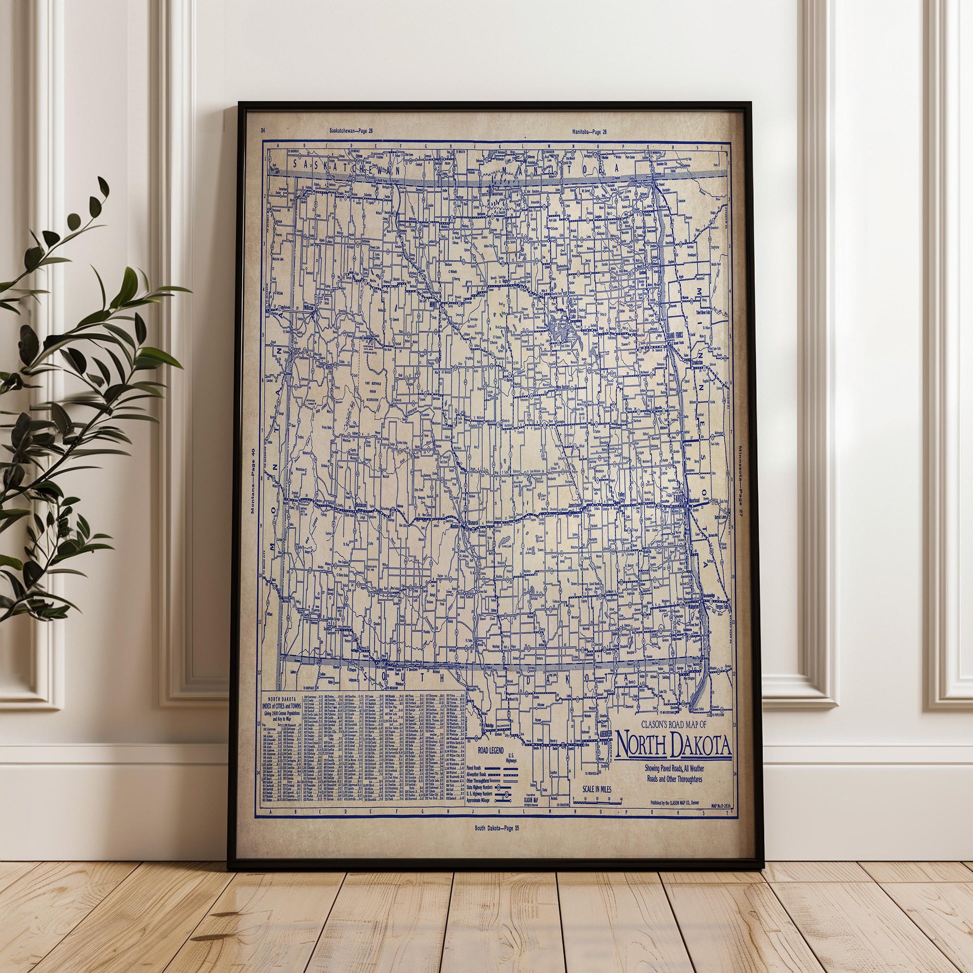 a framed map of North Dakota, with a detailed blue and white color scheme.