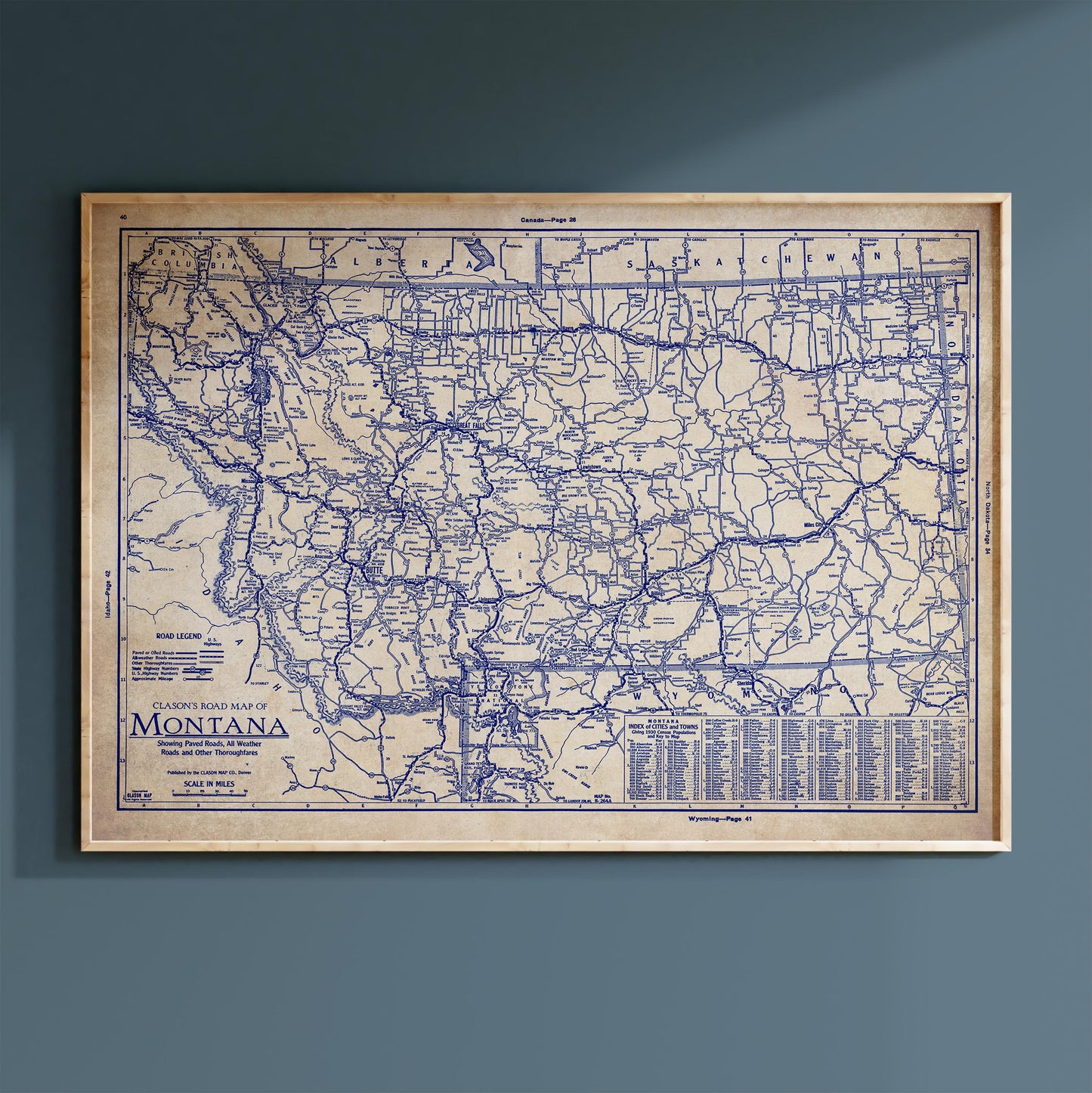 The image is a framed vintage map of Montana, showing the state's roads and highways in a detailed and detailed manner.