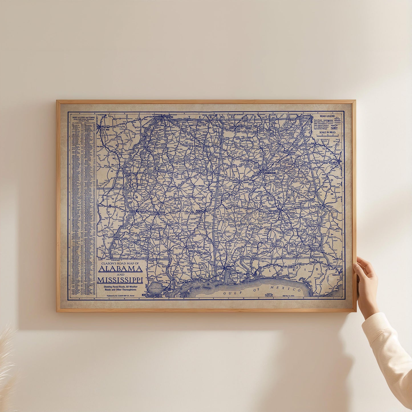 A framed map of Alabama and Mississippi, with the text "ALABAMA" and "MISSISSIPPI" printed on it.