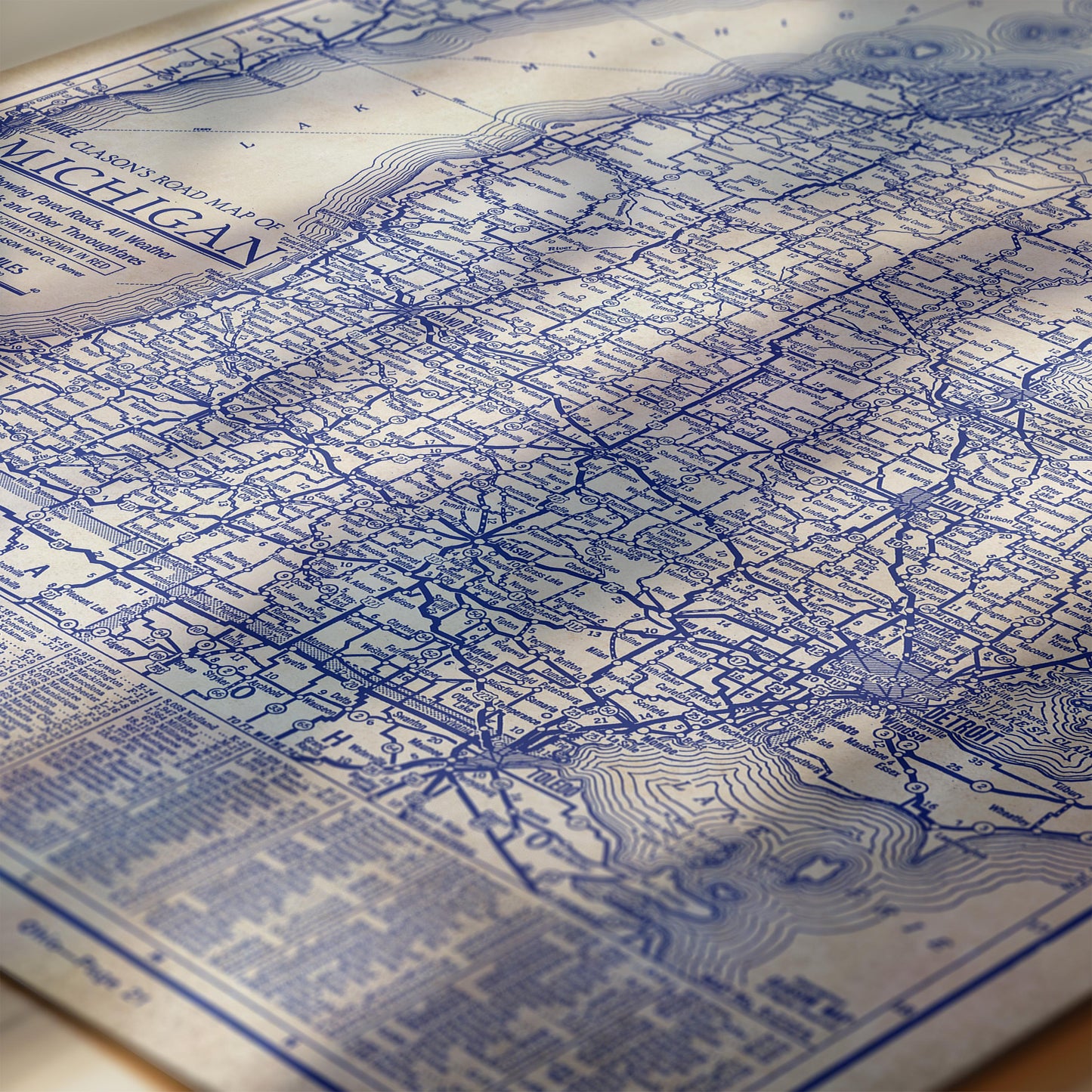 The image is a detailed map of Michigan, showing the state's roads, highways, and major cities.