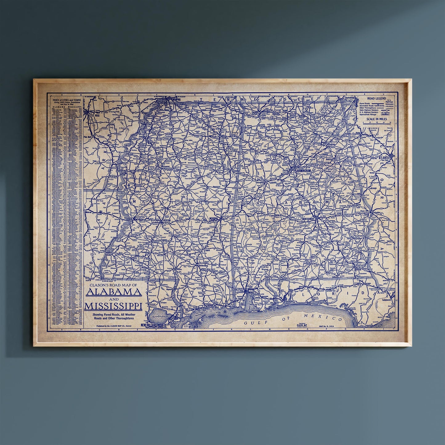 The image is a framed vintage map of Alabama and Mississippi, depicting the state's roads and highways in a detailed and intricate manner.