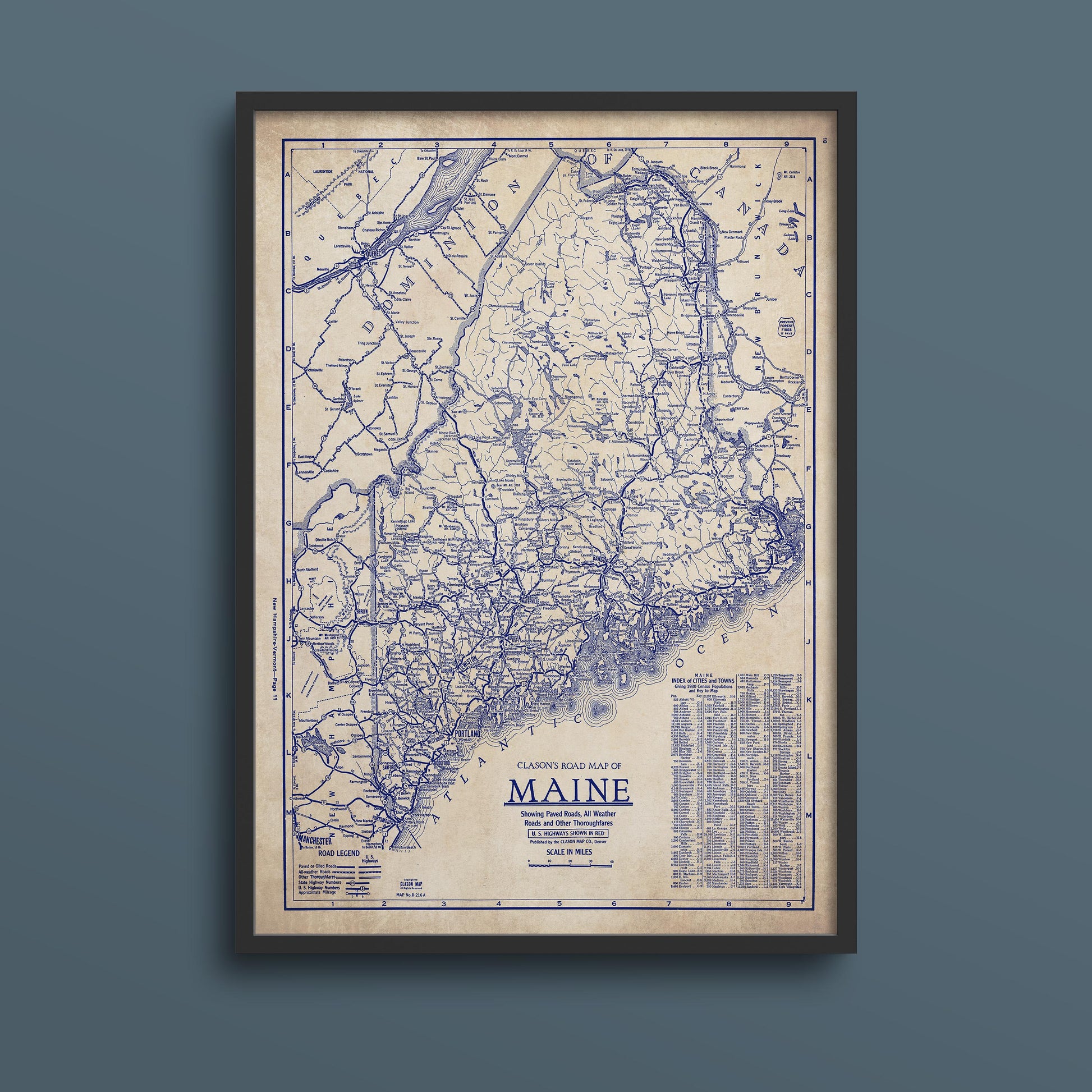The image is a framed vintage map of Maine, depicting the state's road network and surrounding areas.